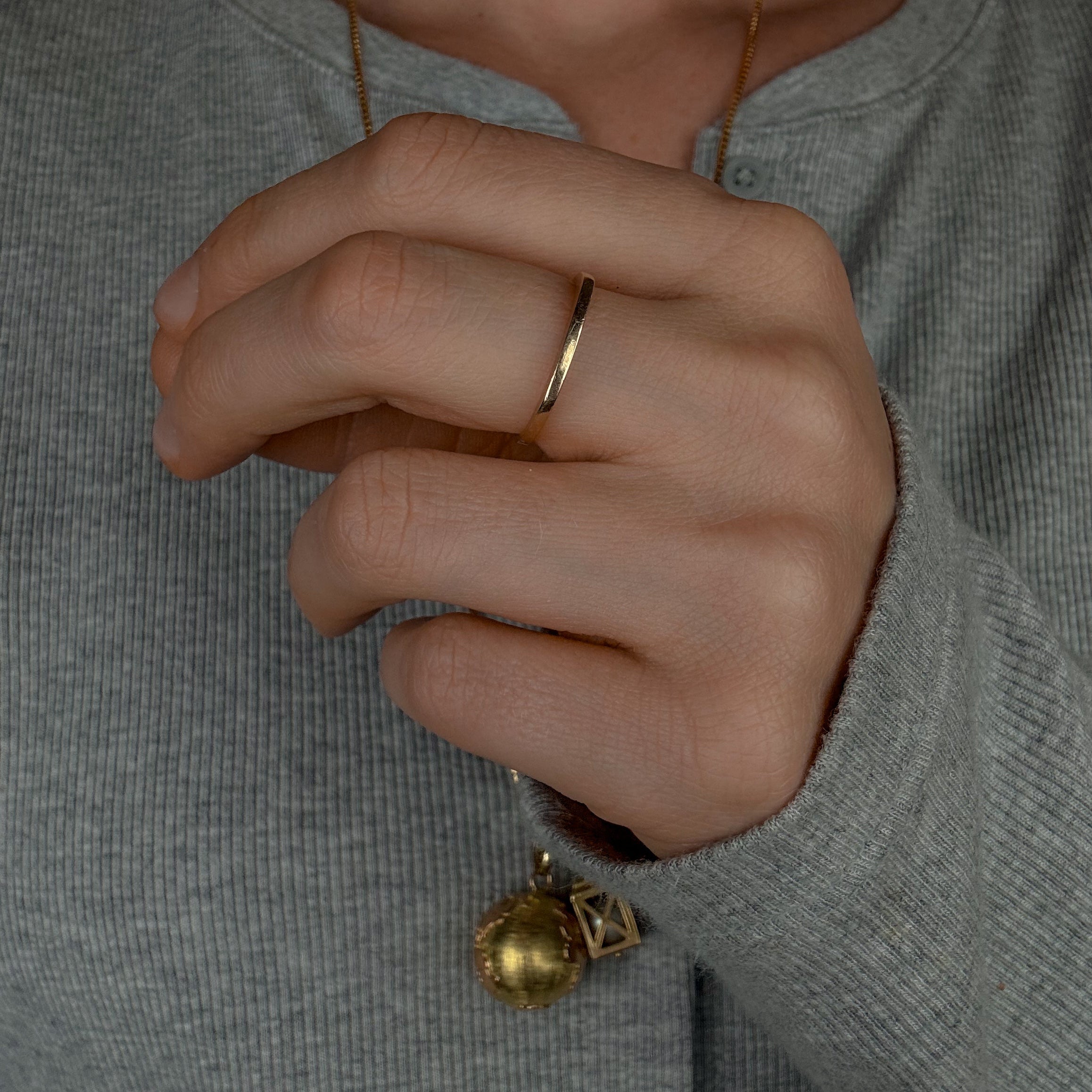 Sleek Raised Gold Band