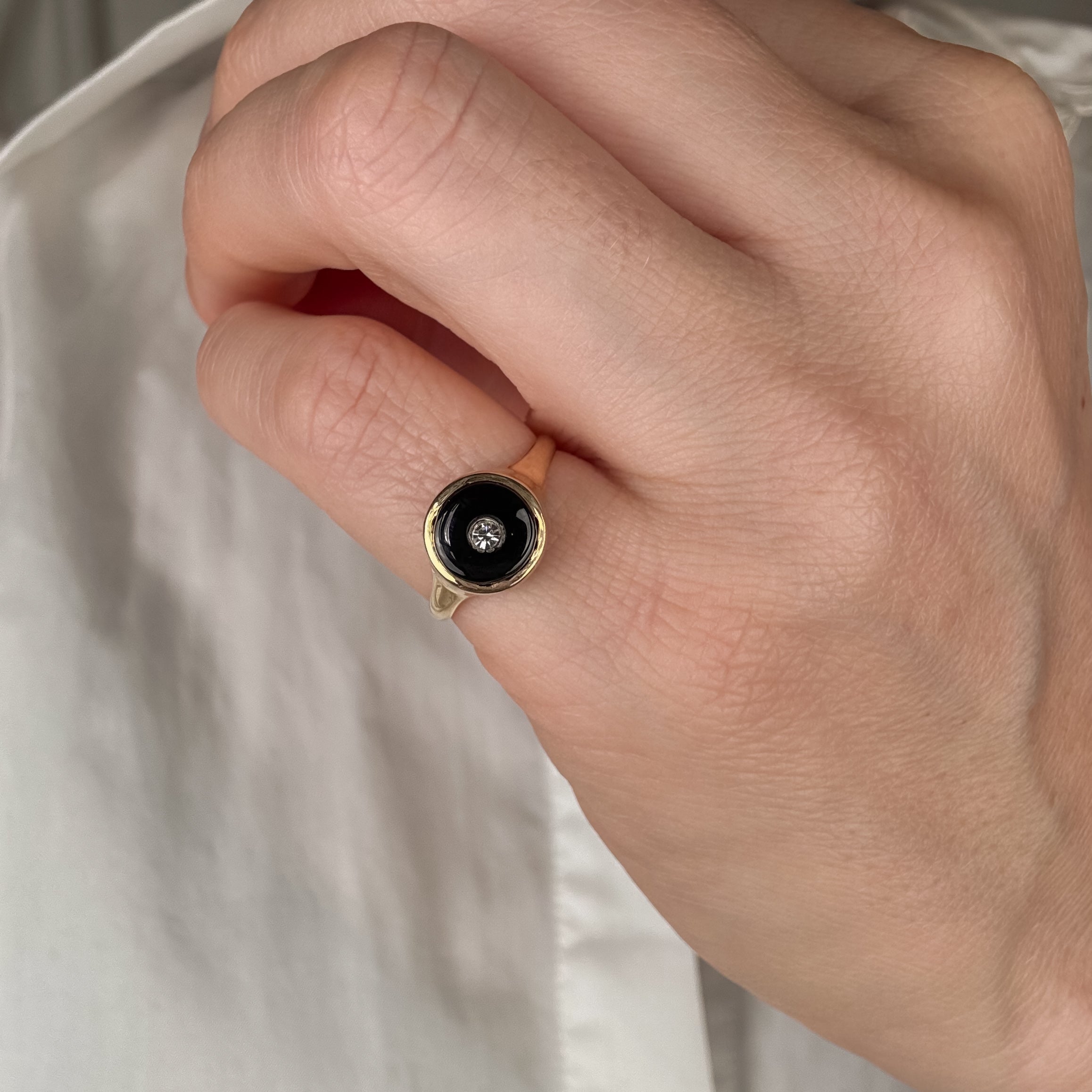 Circular Onyx and Diamond Ring