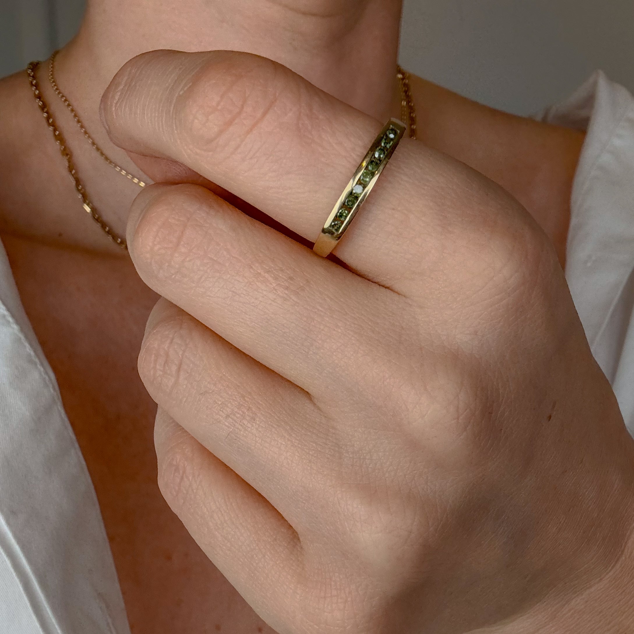 Green Sapphire Channel Set Gold Band