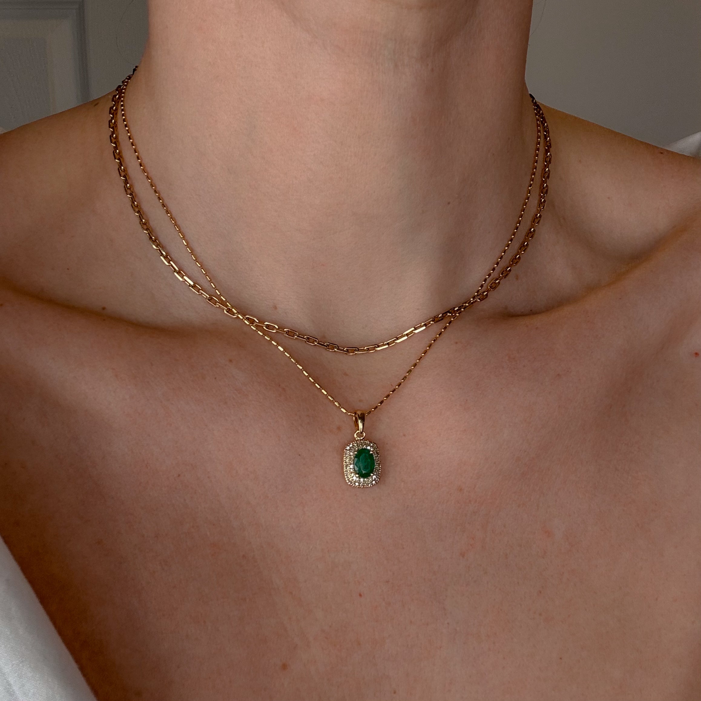 Emerald and Diamond Halo Pendant