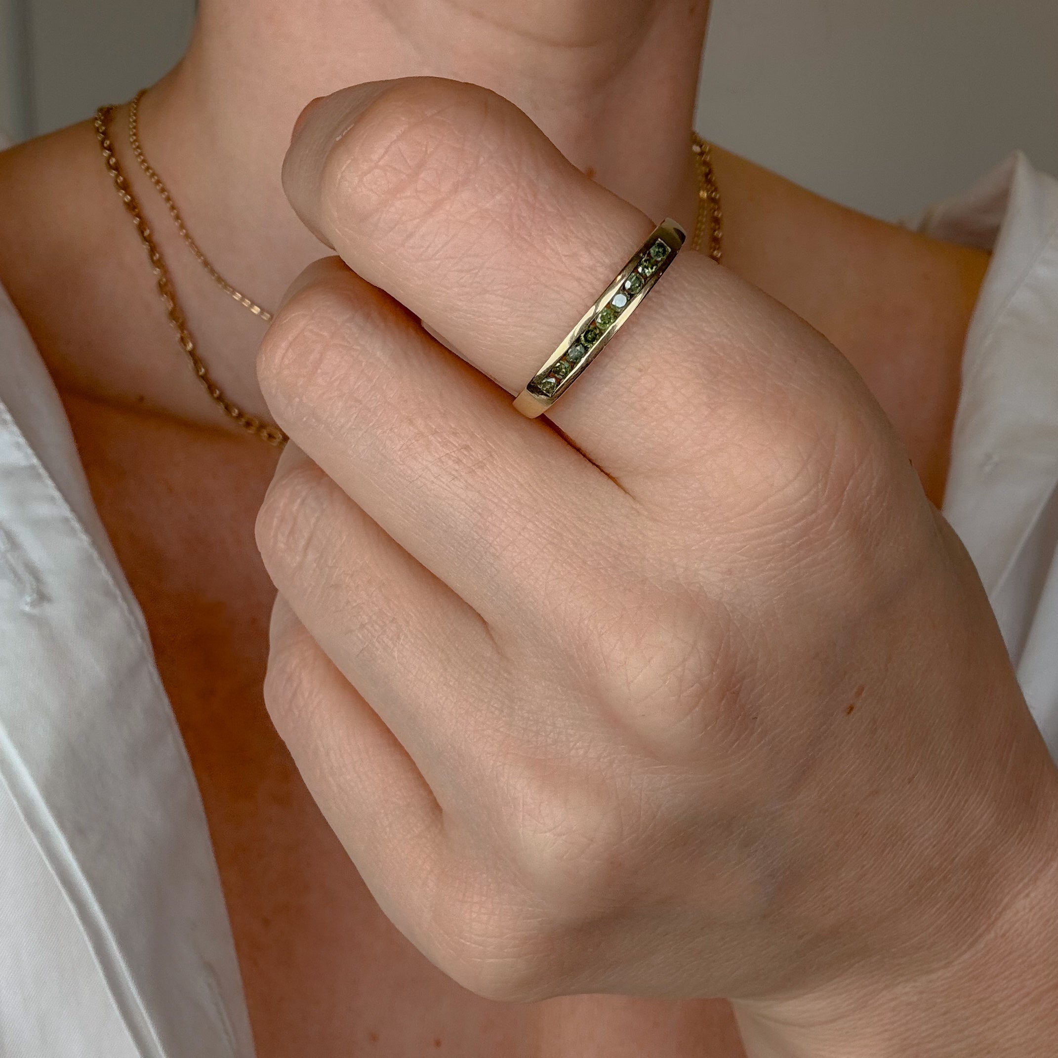 Green Sapphire Channel Set Gold Band