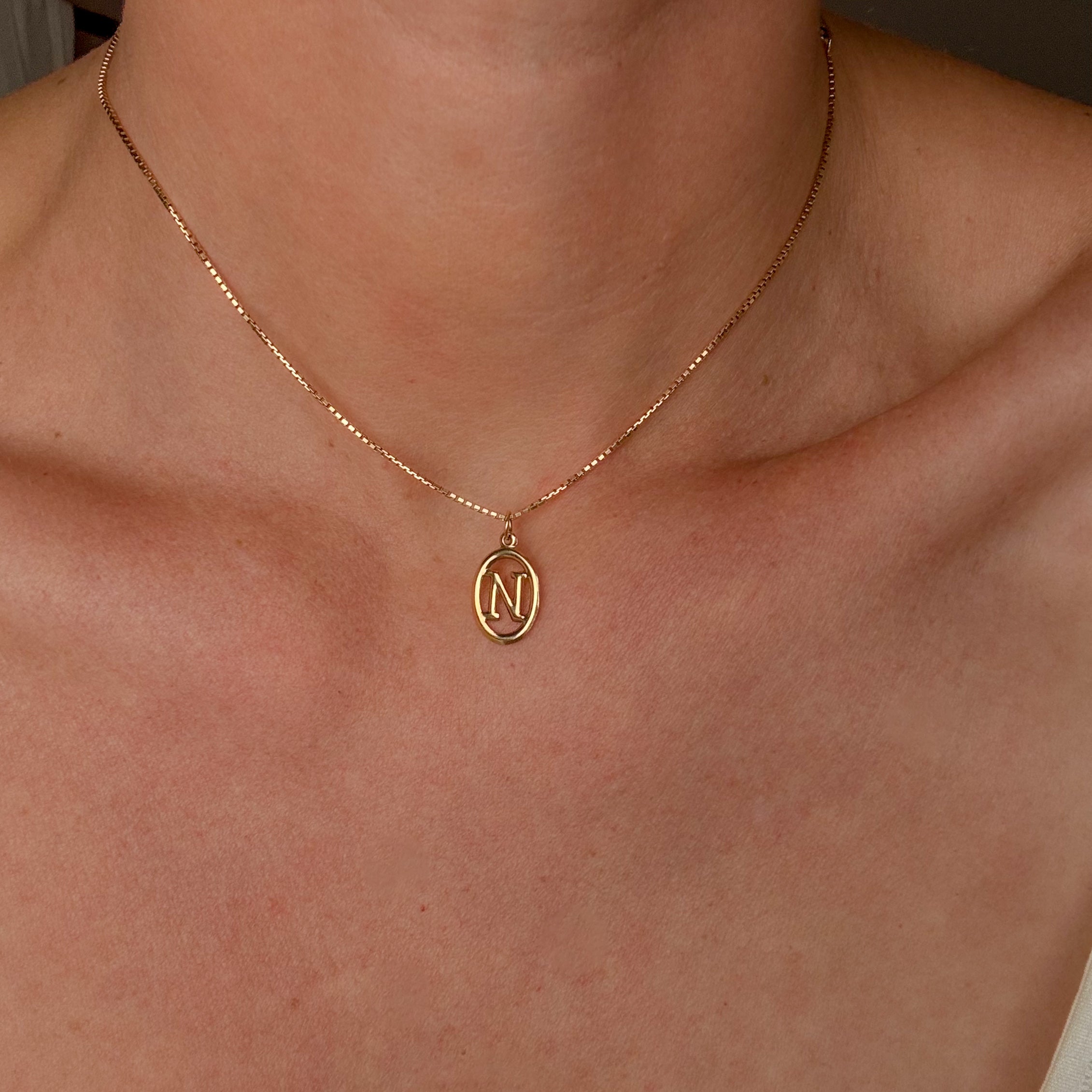 'N' Oval Charm
