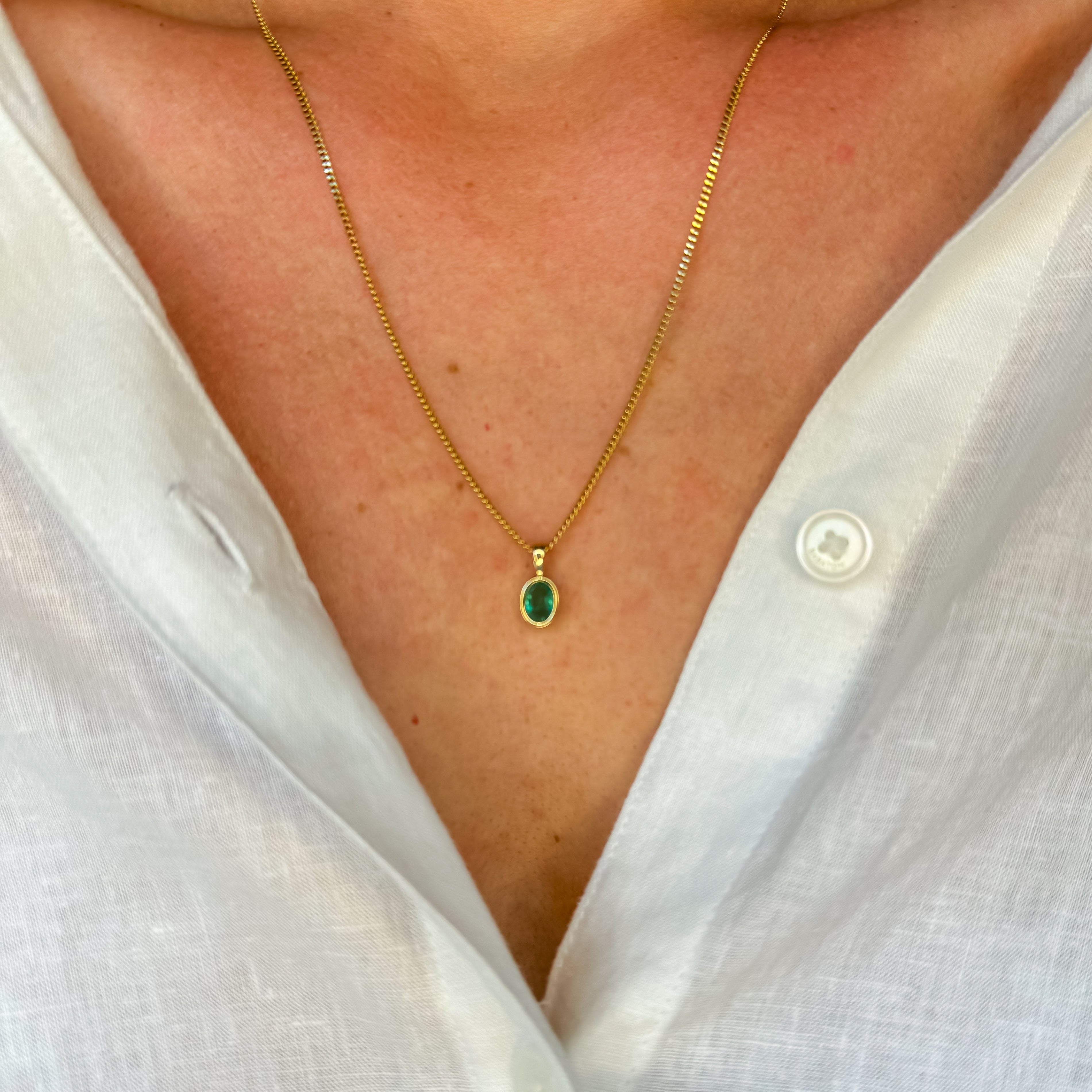 Bezel-Set Emerald Pendant