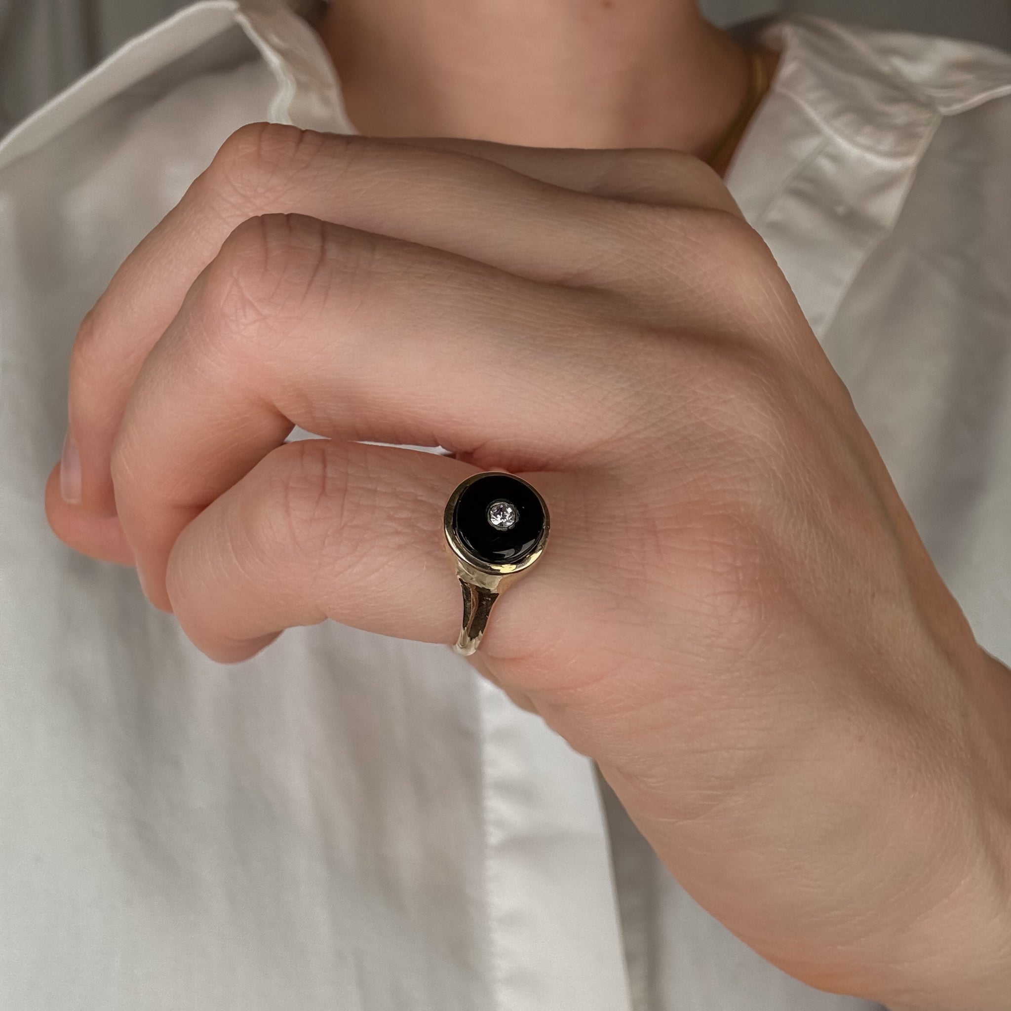 Circular Onyx and Diamond Ring