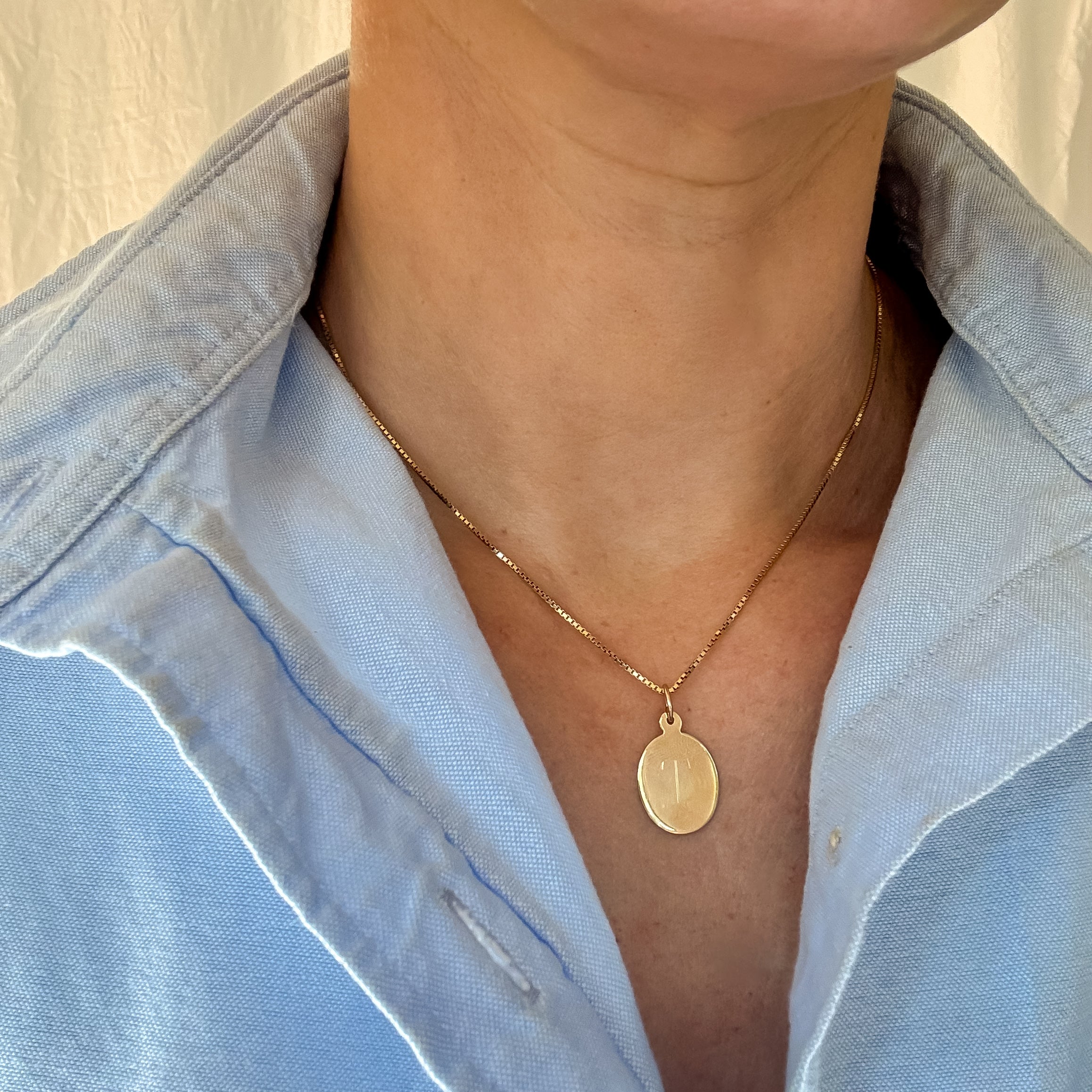 'T' Charm