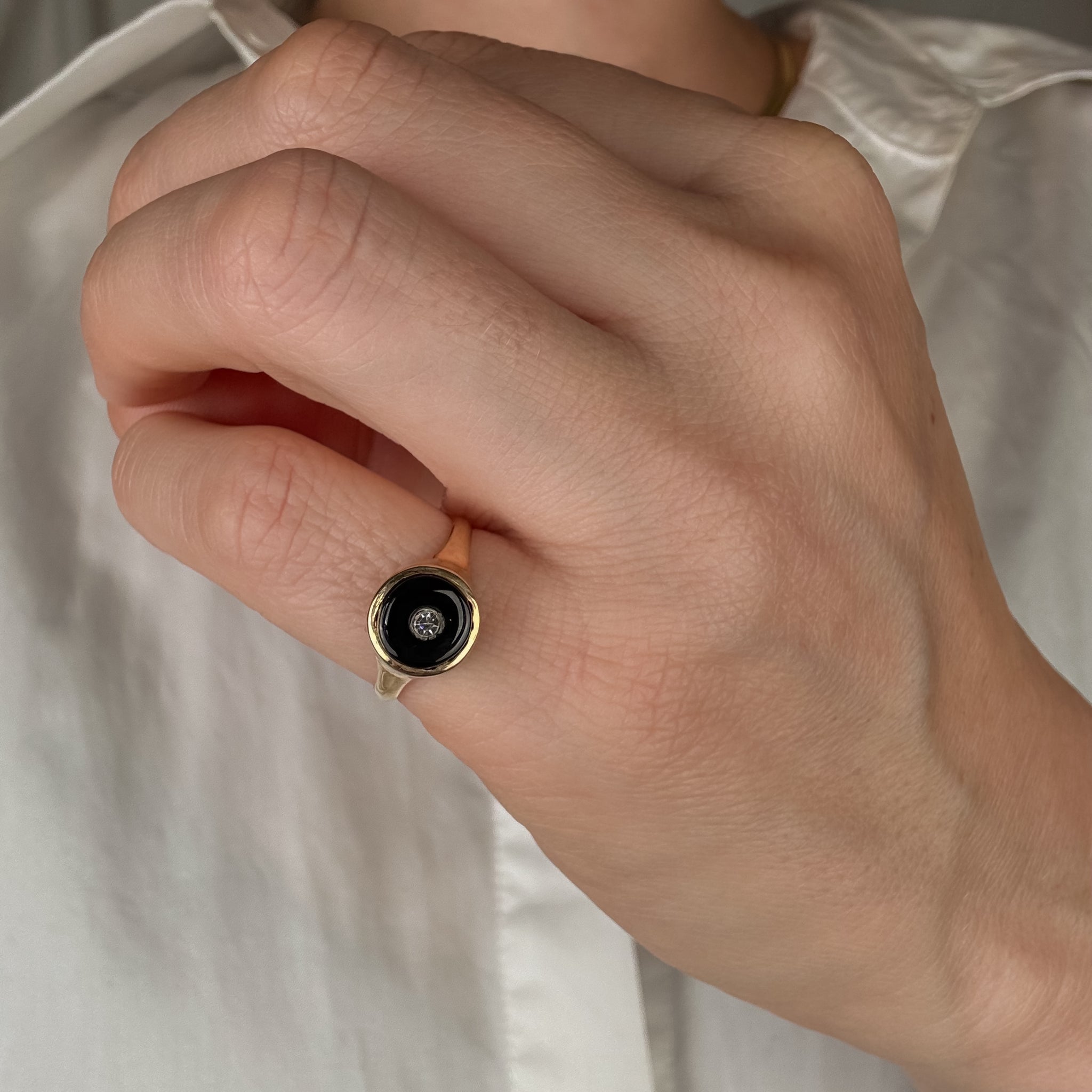 Circular Onyx and Diamond Ring