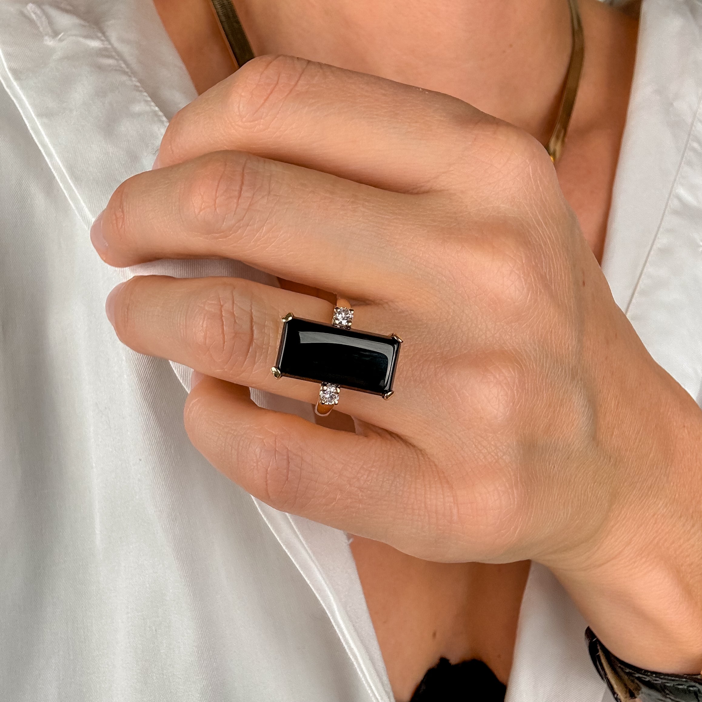 Elongated Onyx and Diamond Ring