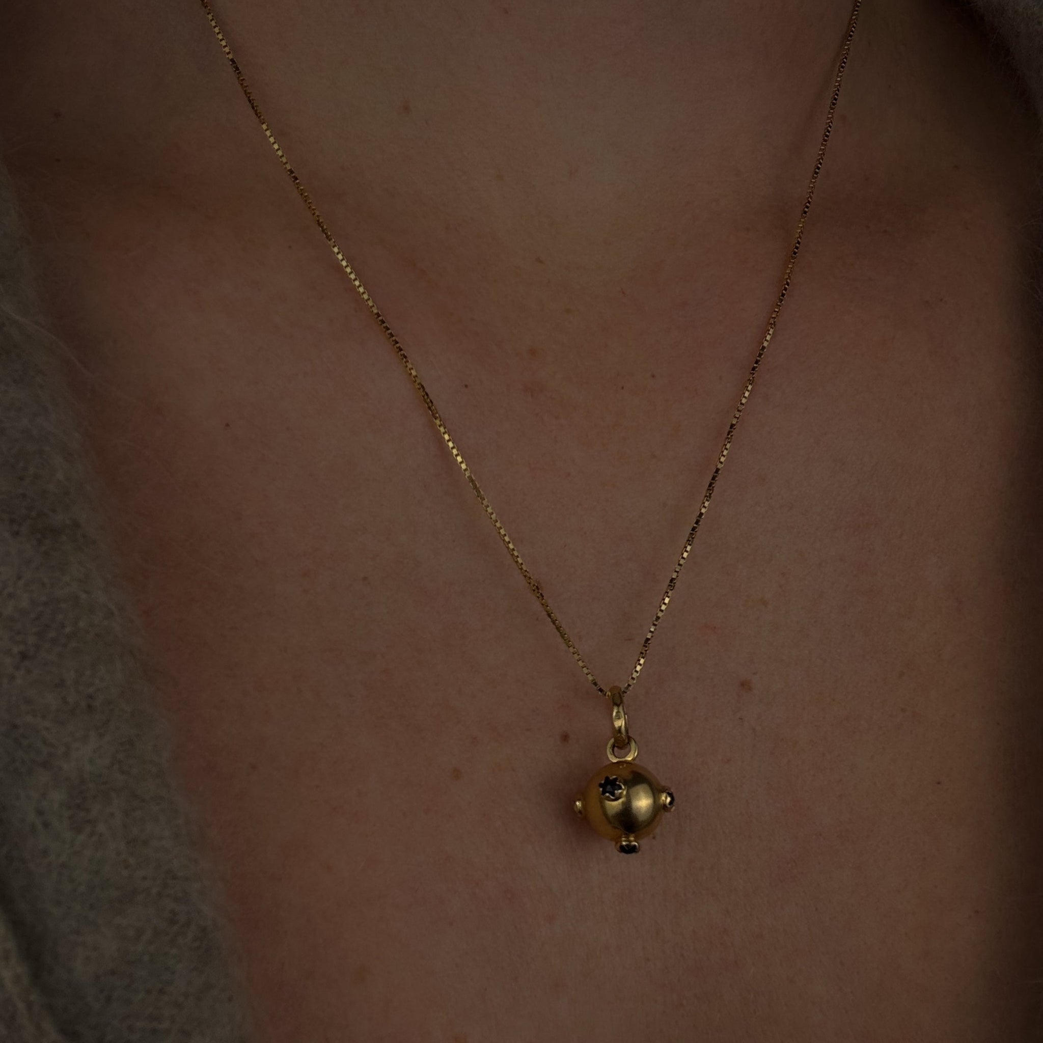 Garnet Sputnik Charm