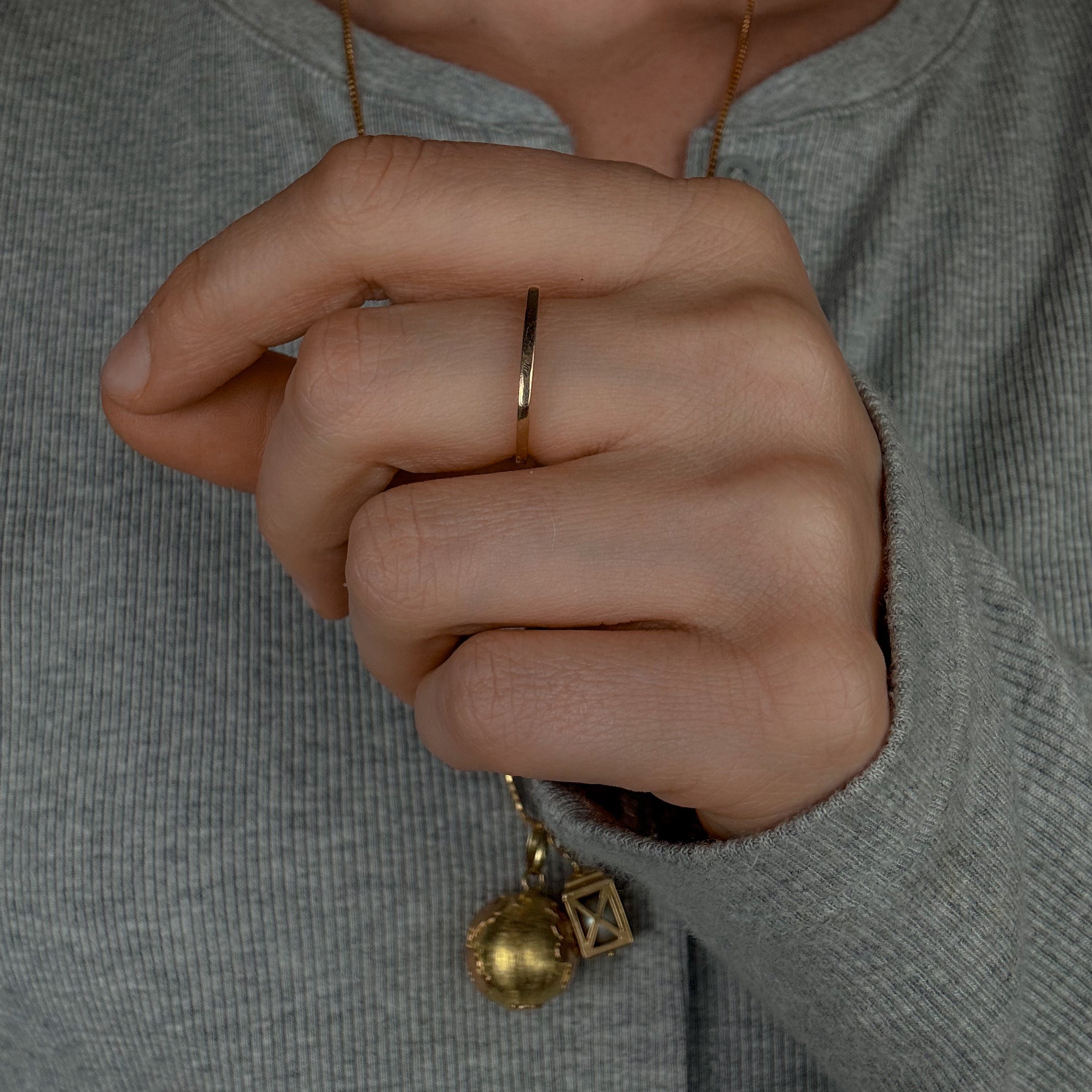 Sleek Raised Gold Band