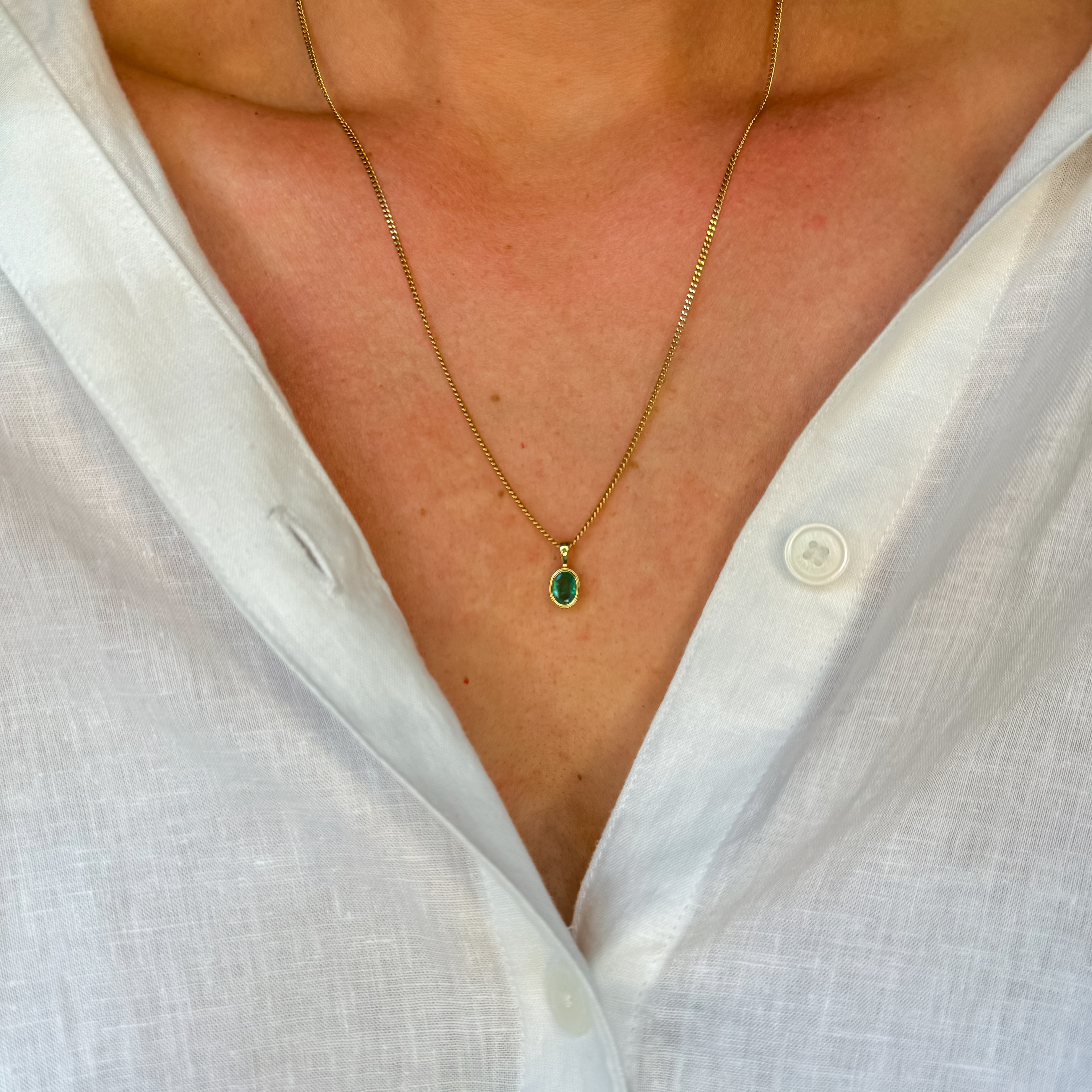 Bezel-Set Emerald Pendant