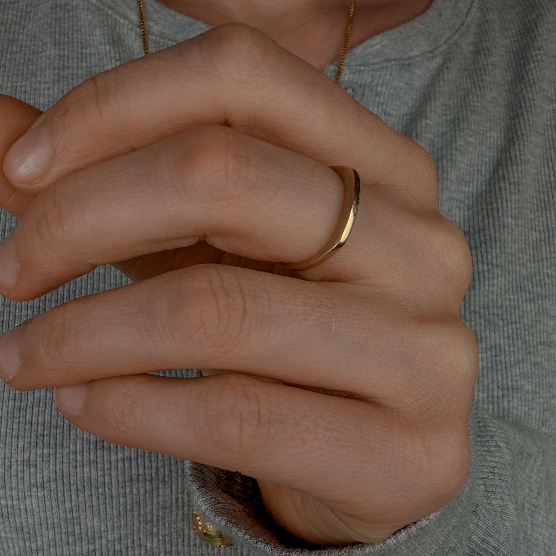 Sleek Raised Gold Band