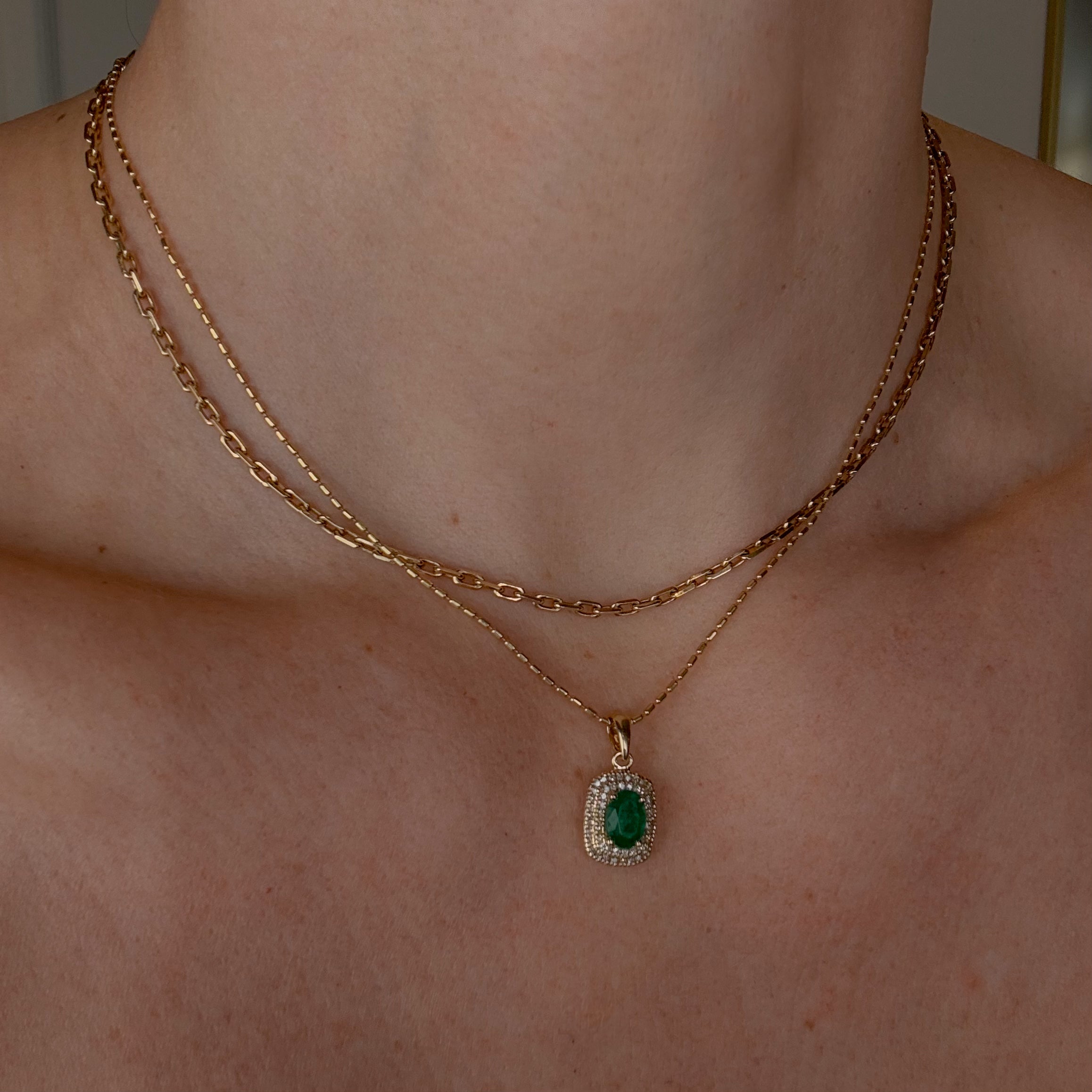 Emerald and Diamond Halo Pendant