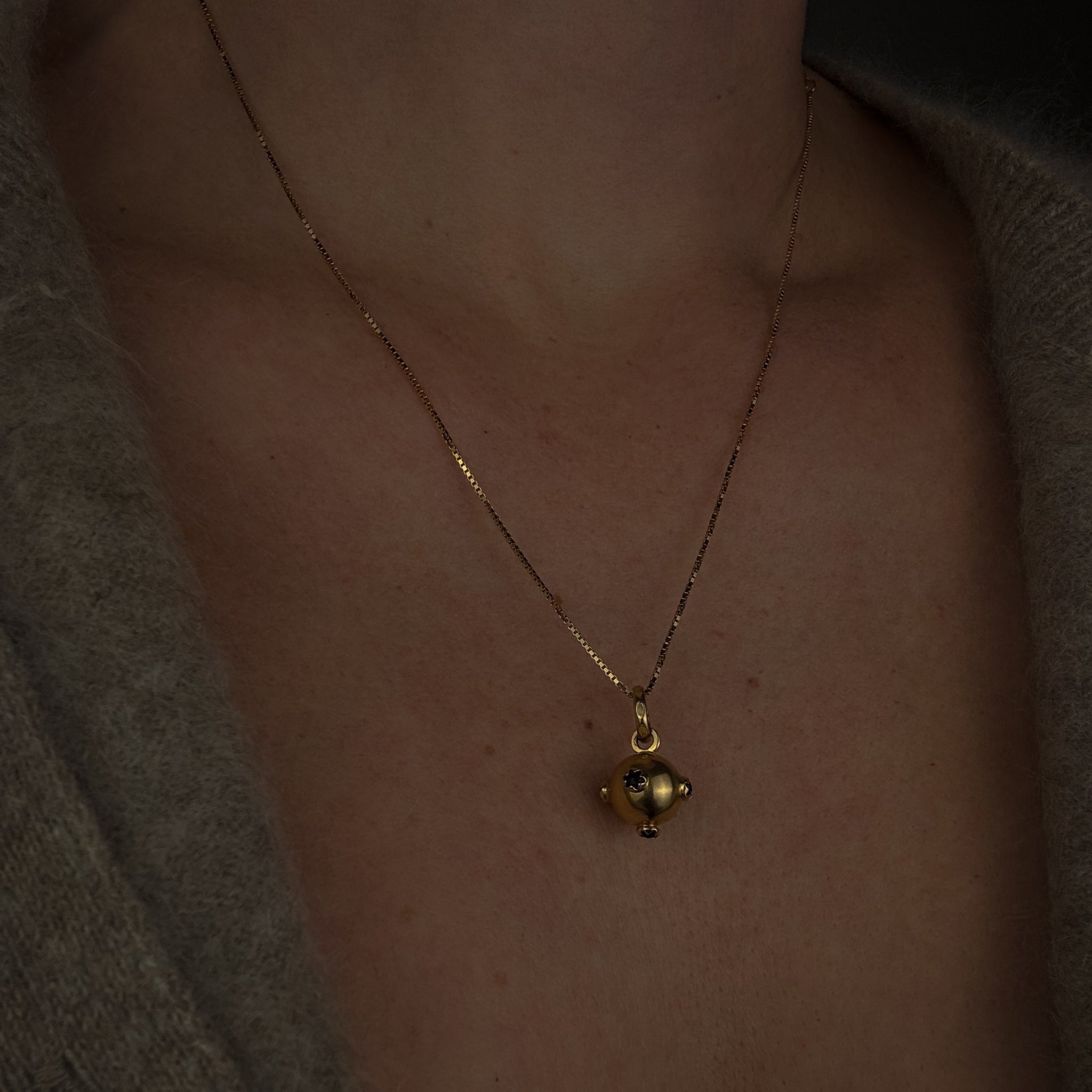 Garnet Sputnik Charm