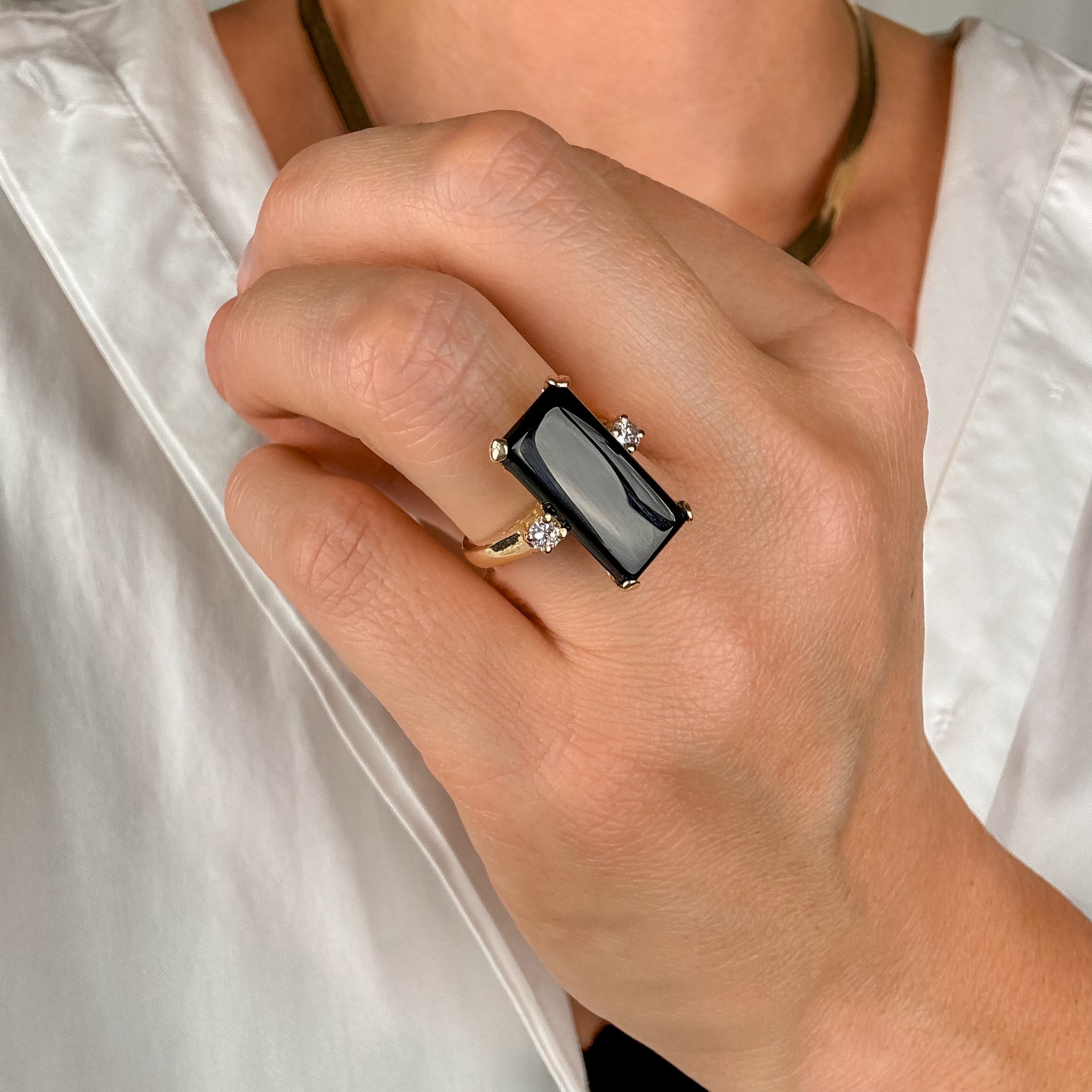 Elongated Onyx and Diamond Ring