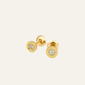Pair of bezel-set round diamond stud earrings in 10k yellow gold with screw-back posts
