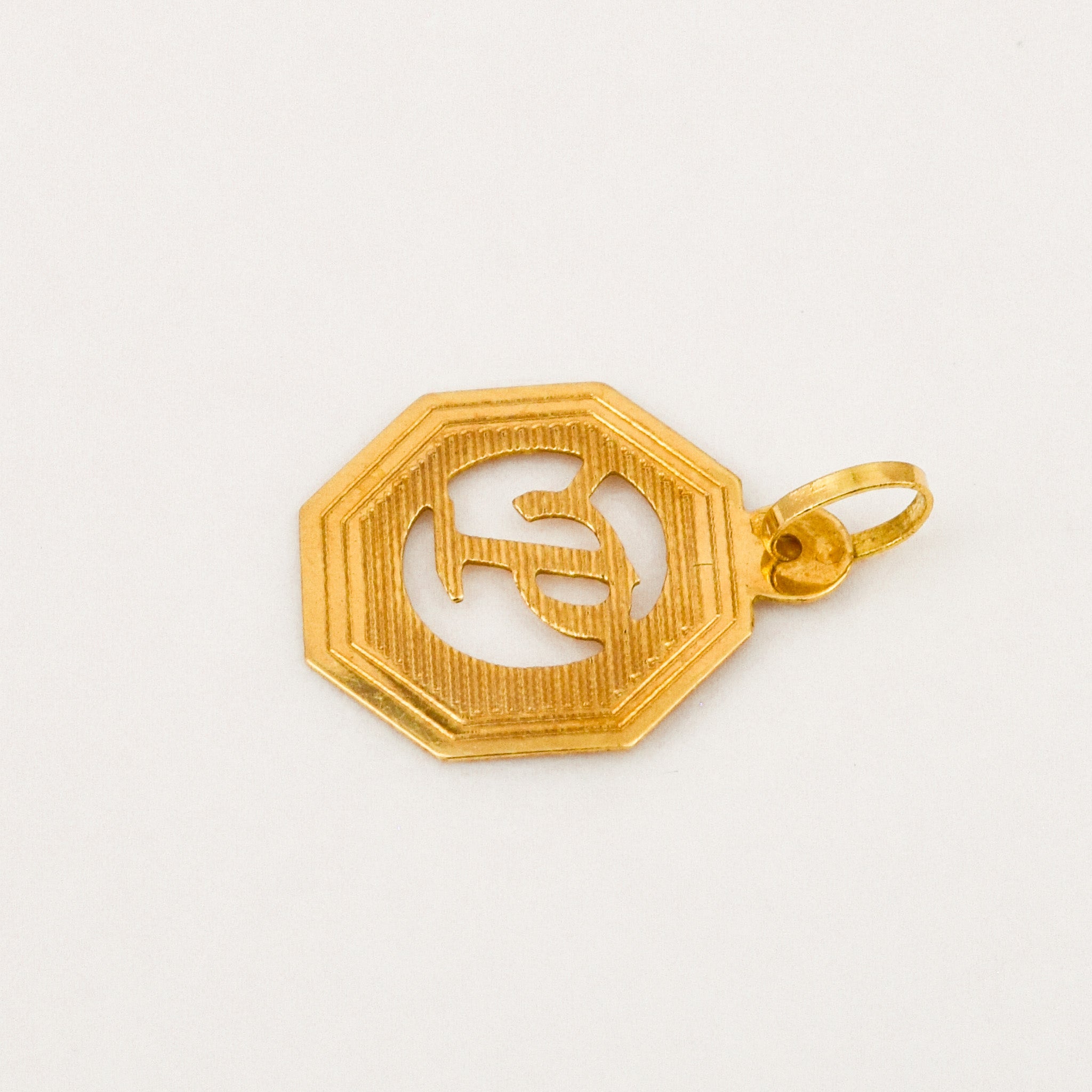 Octa 'P' Charm