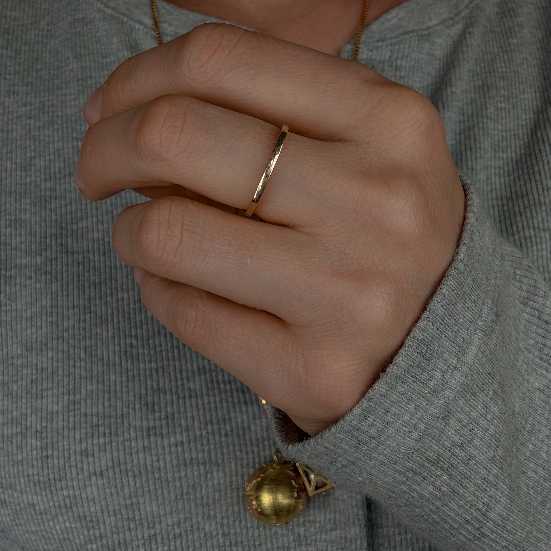 Sleek Raised Gold Band