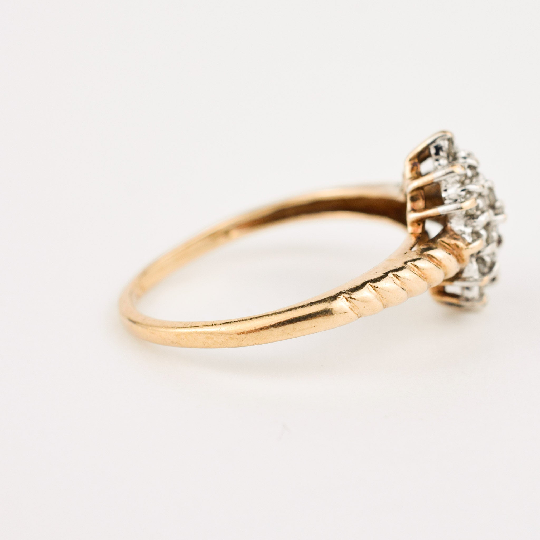 vintage gold rope diamond cluster ring