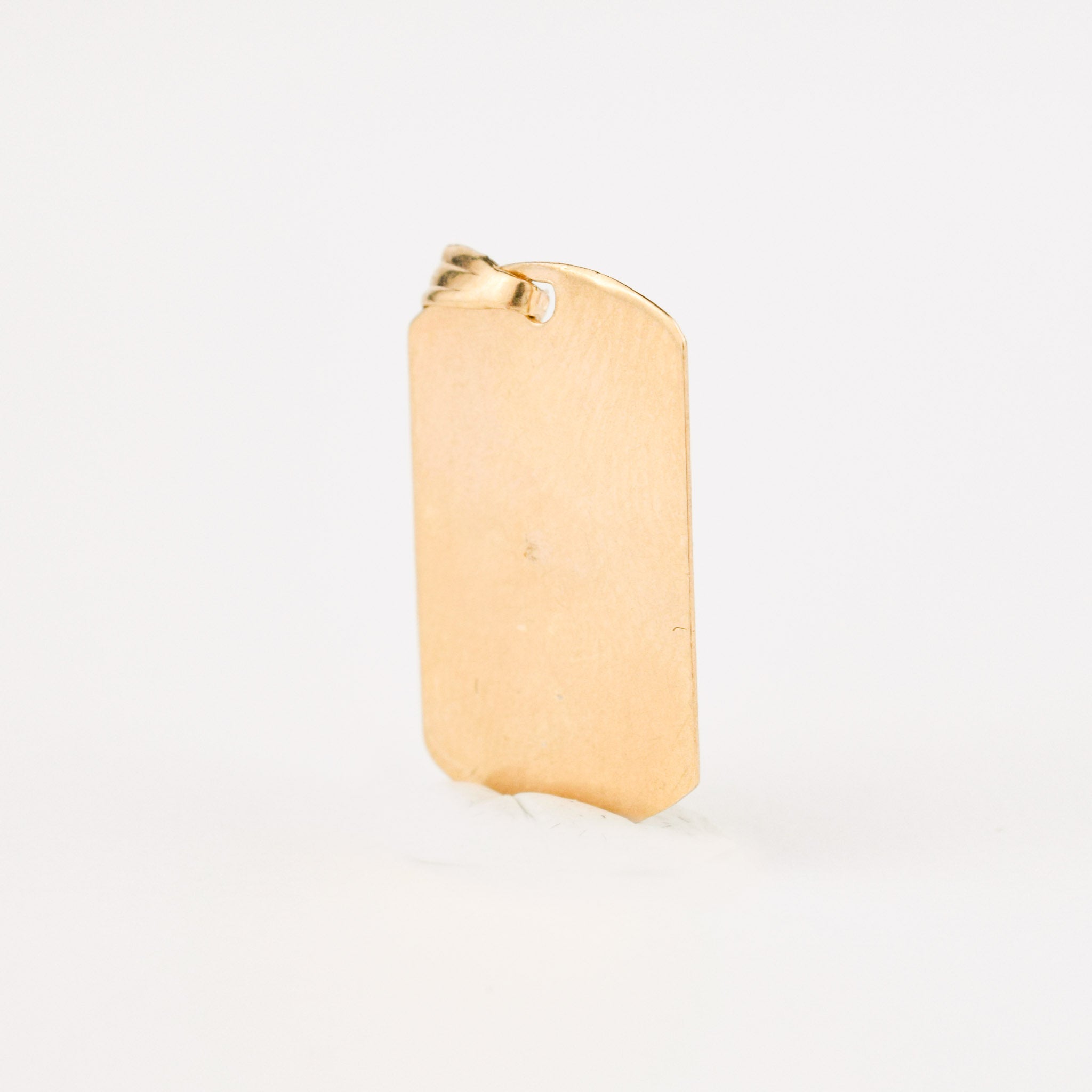 vintage gold dog tag charm 