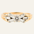 vintage engagement ring with baguette diamonds on band