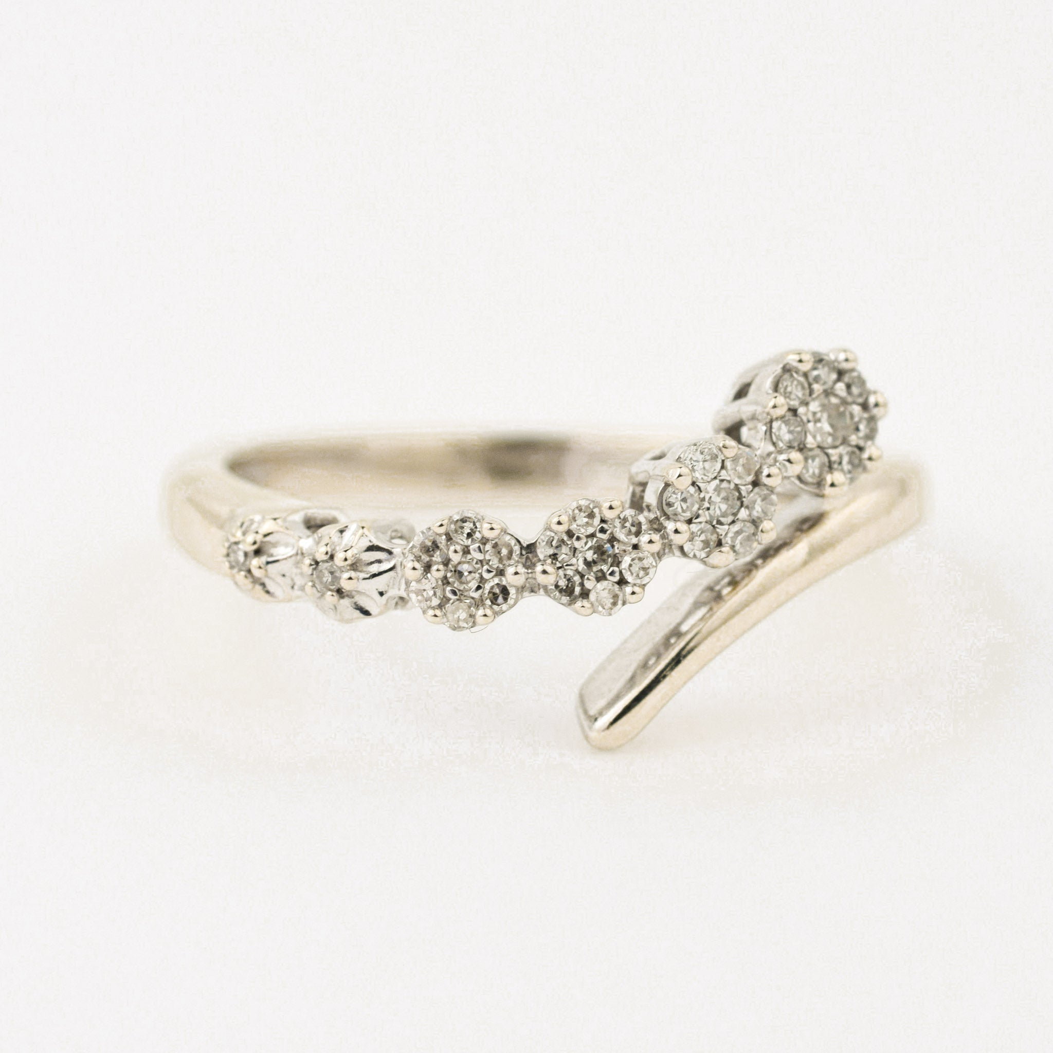 vintage white gold diamond floral ring