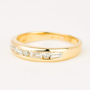 vintage gold diamond band with baguette and brilliant cut diamonds 