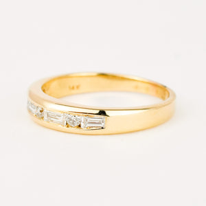 vintage gold diamond band with baguette and brilliant cut diamonds 