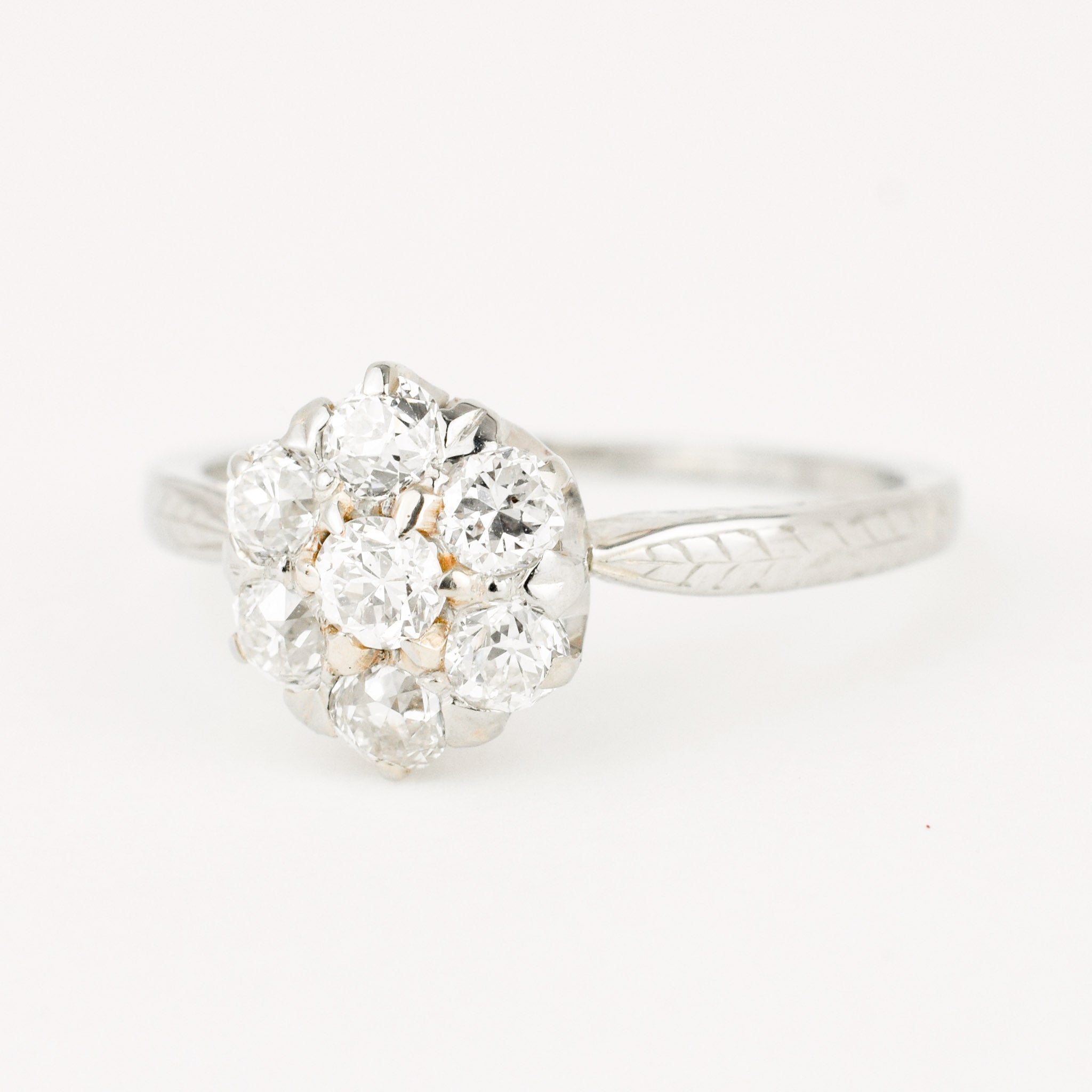 antique old mine cut diamond cluster engagement ring