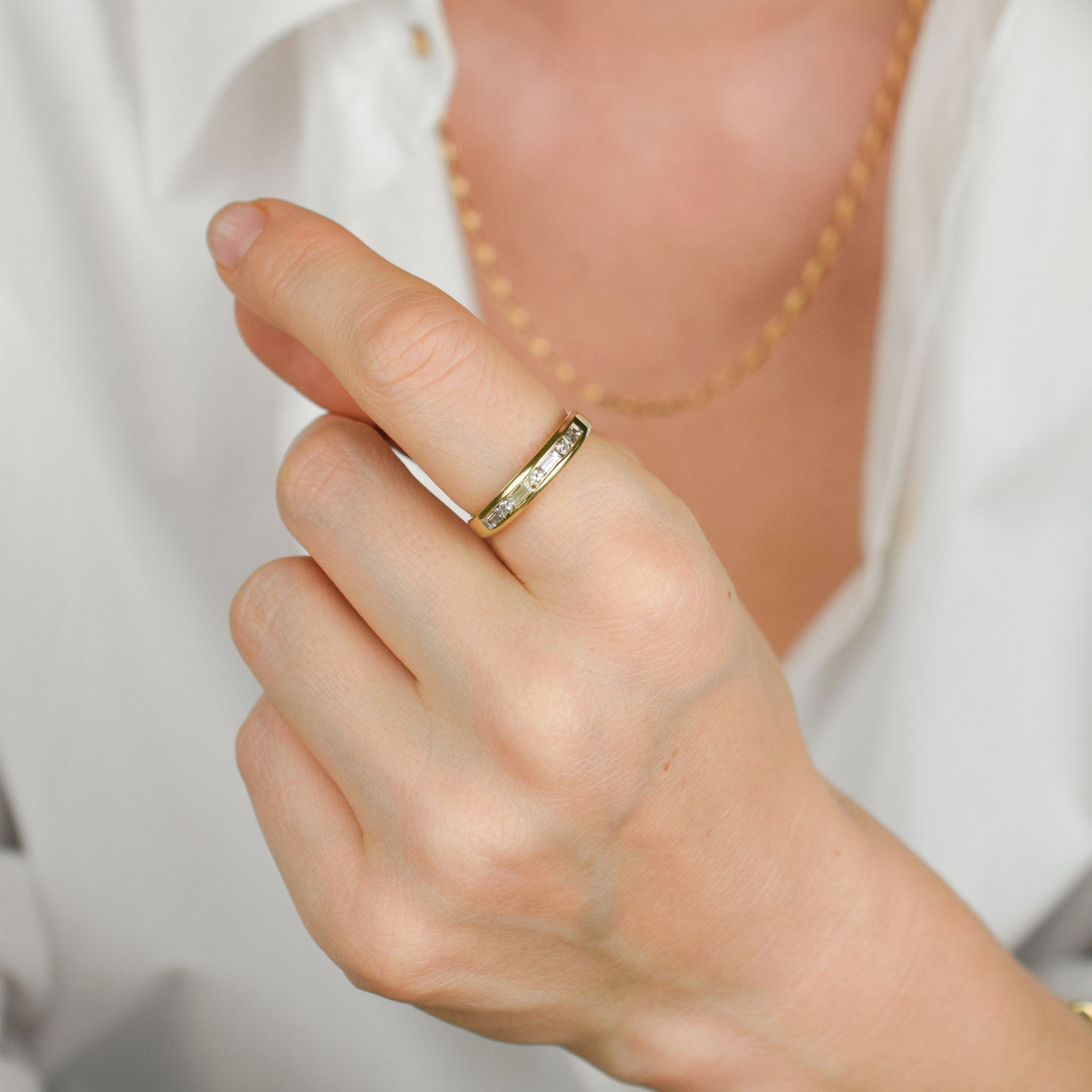 vintage gold diamond band with baguette and brilliant cut diamonds 