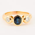 bezel set diamond and sapphire trilogy ring