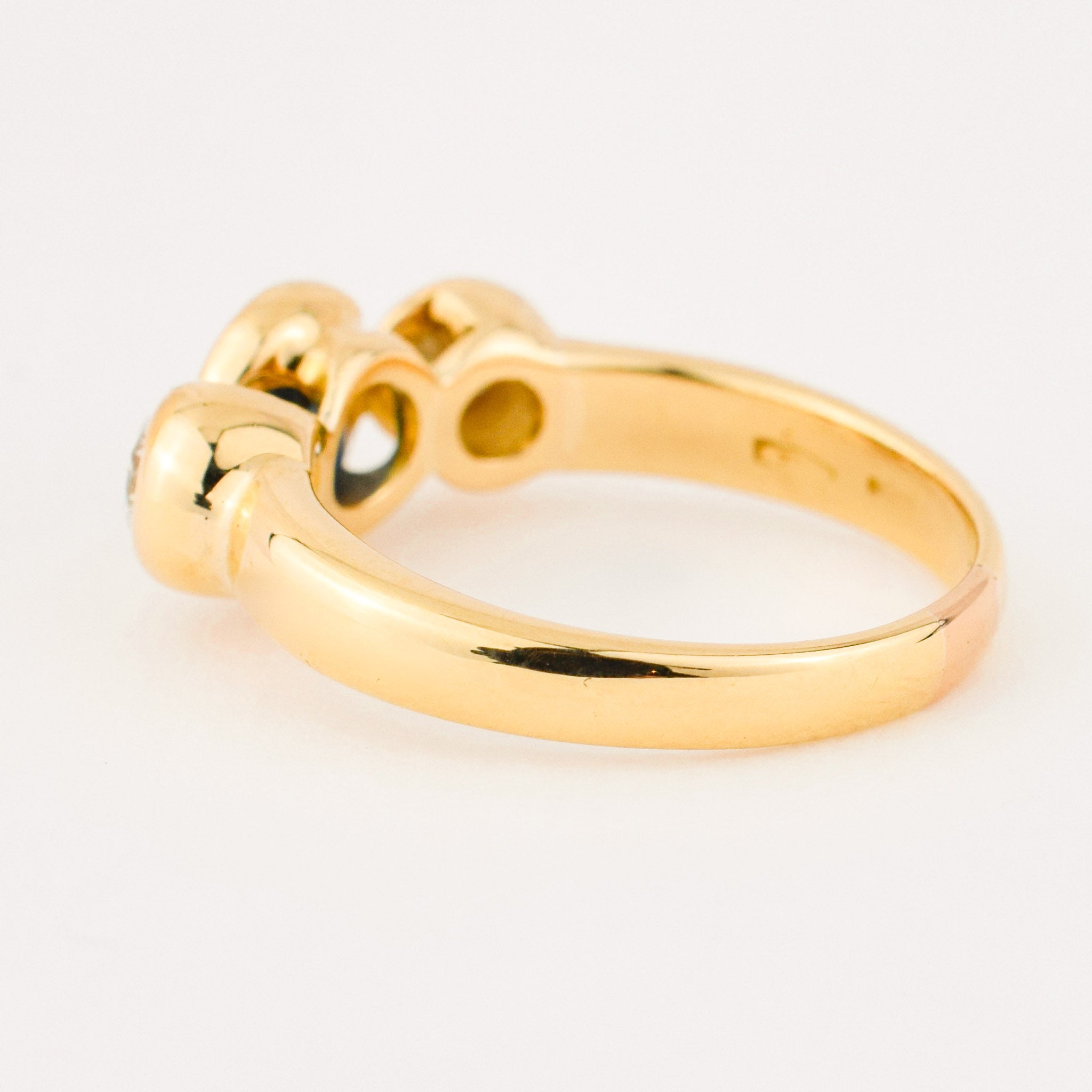 bezel set diamond and sapphire trilogy ring