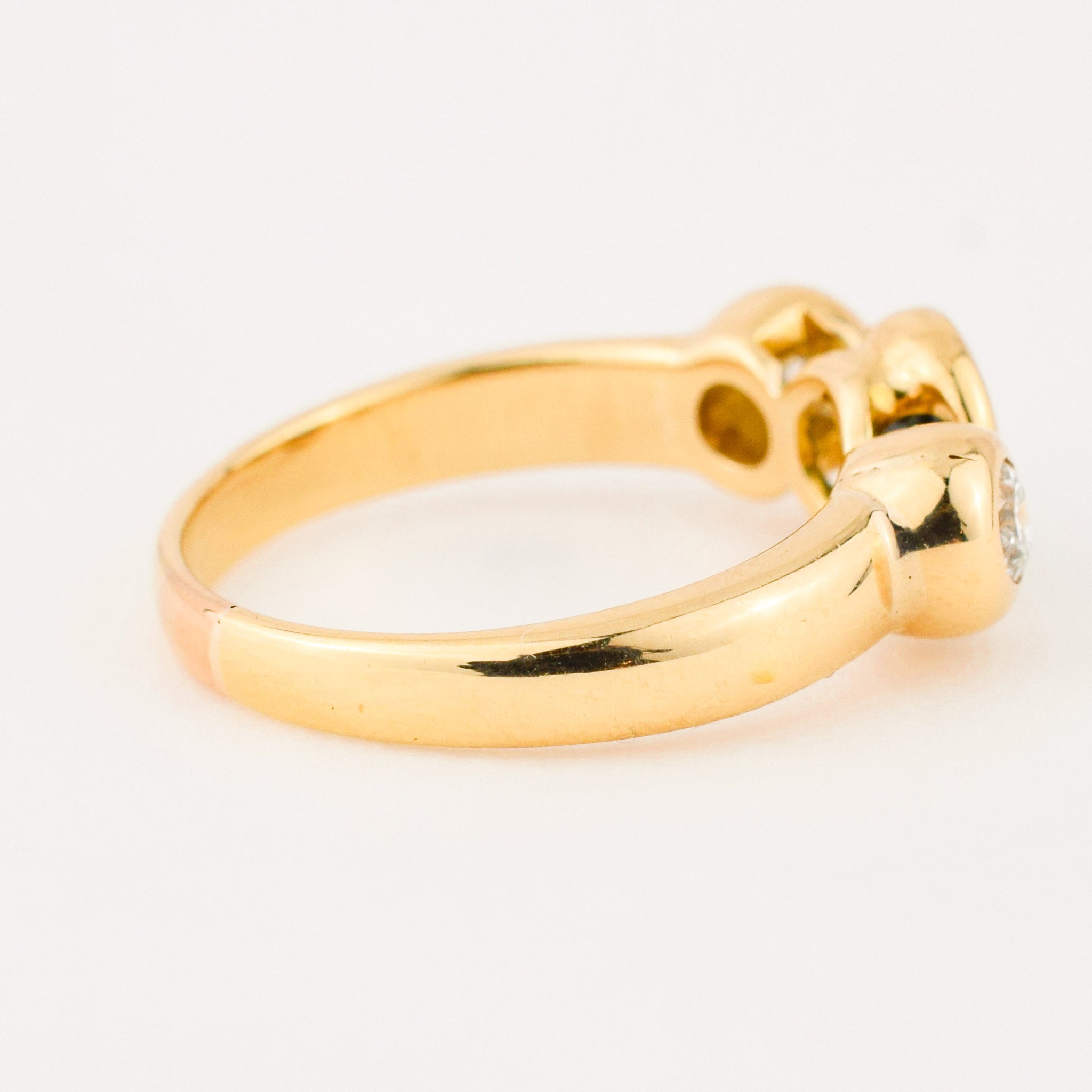 bezel set diamond and sapphire trilogy ring