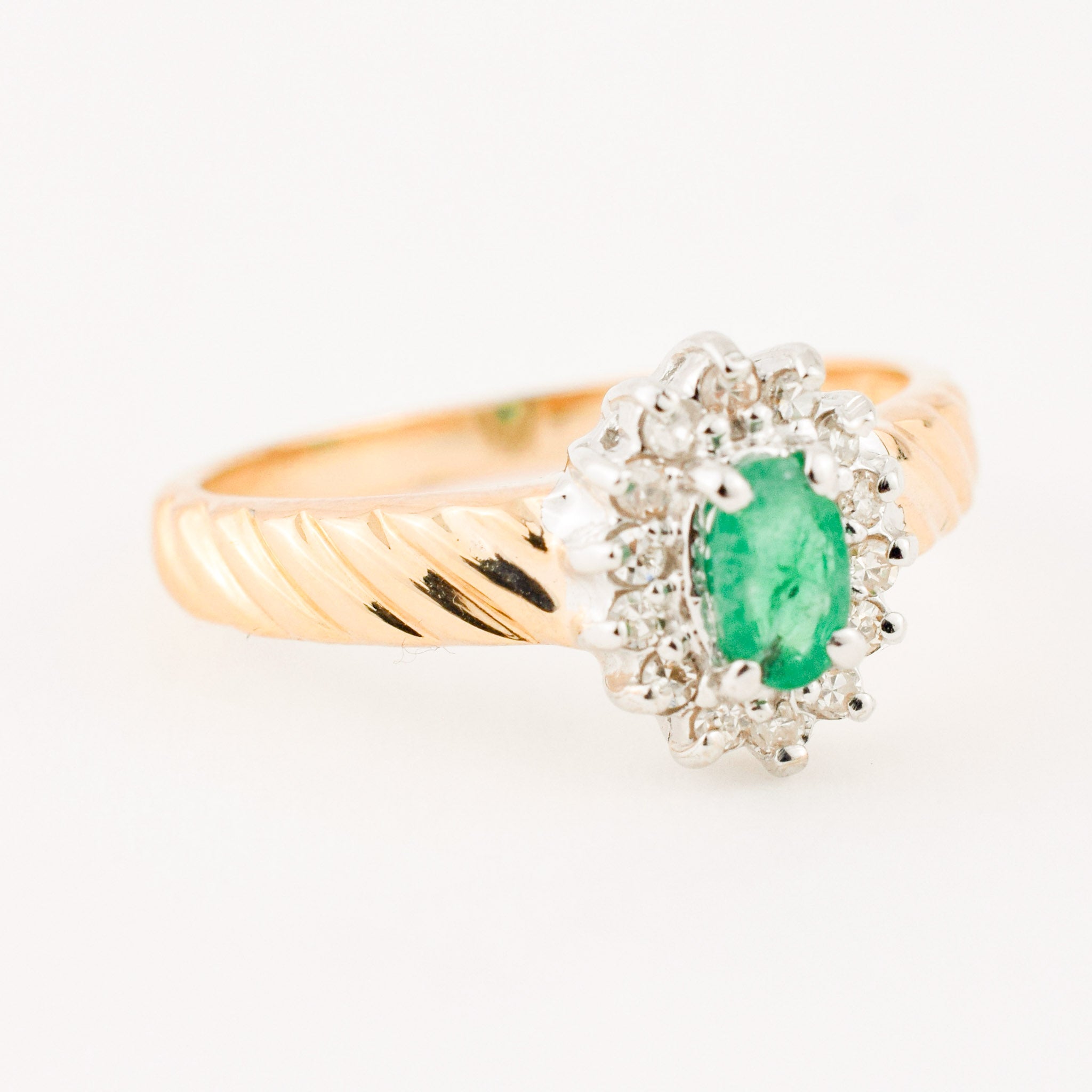 emerald and diamond halo ring 
