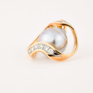 vintage gold baroque pearl pendant with brilliant cut diamonds