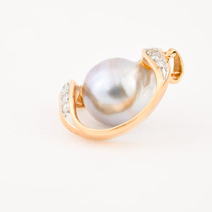 vintage gold baroque pearl pendant with brilliant cut diamonds