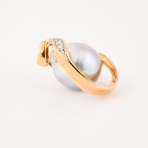 vintage gold baroque pearl pendant with brilliant cut diamonds