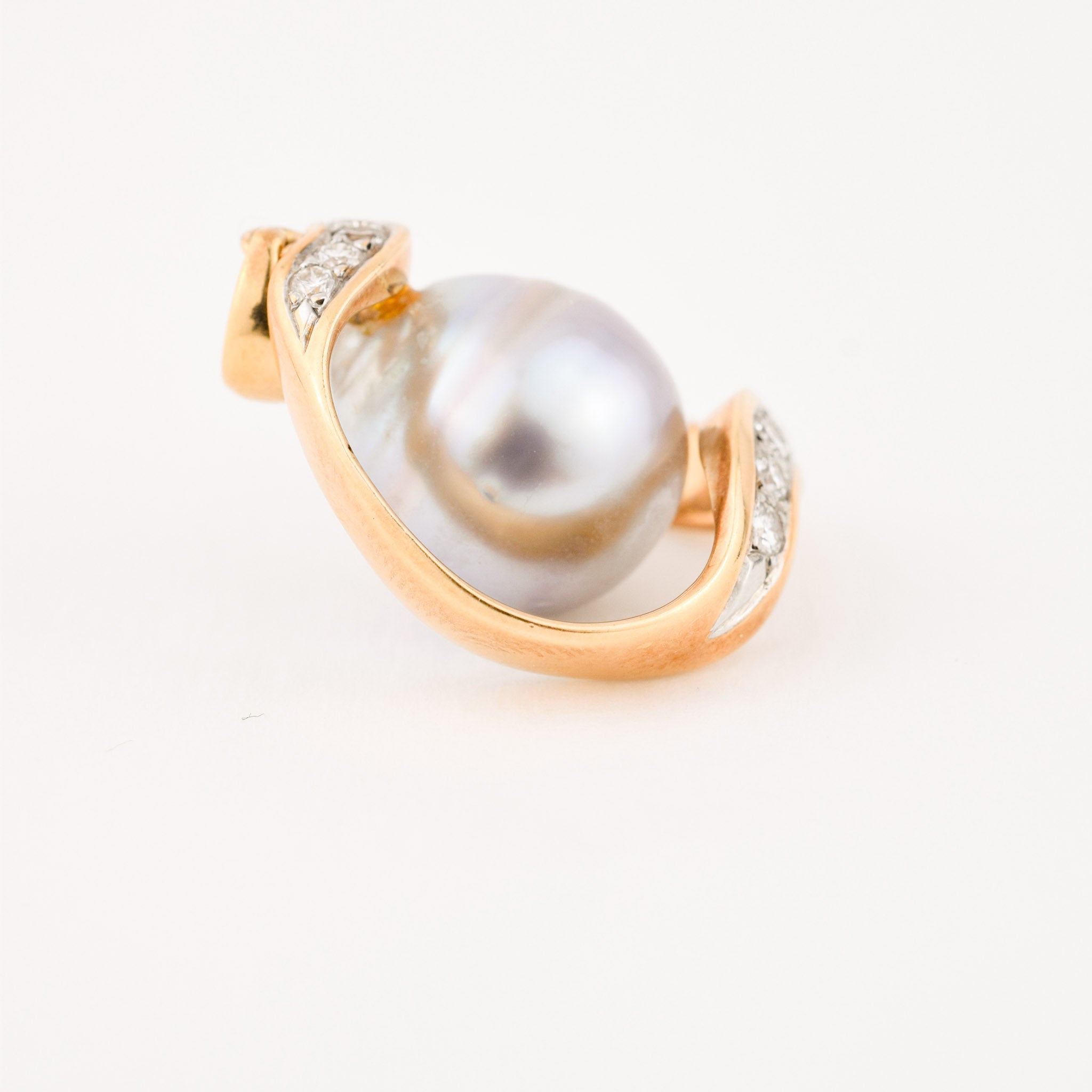 vintage gold baroque pearl pendant with brilliant cut diamonds