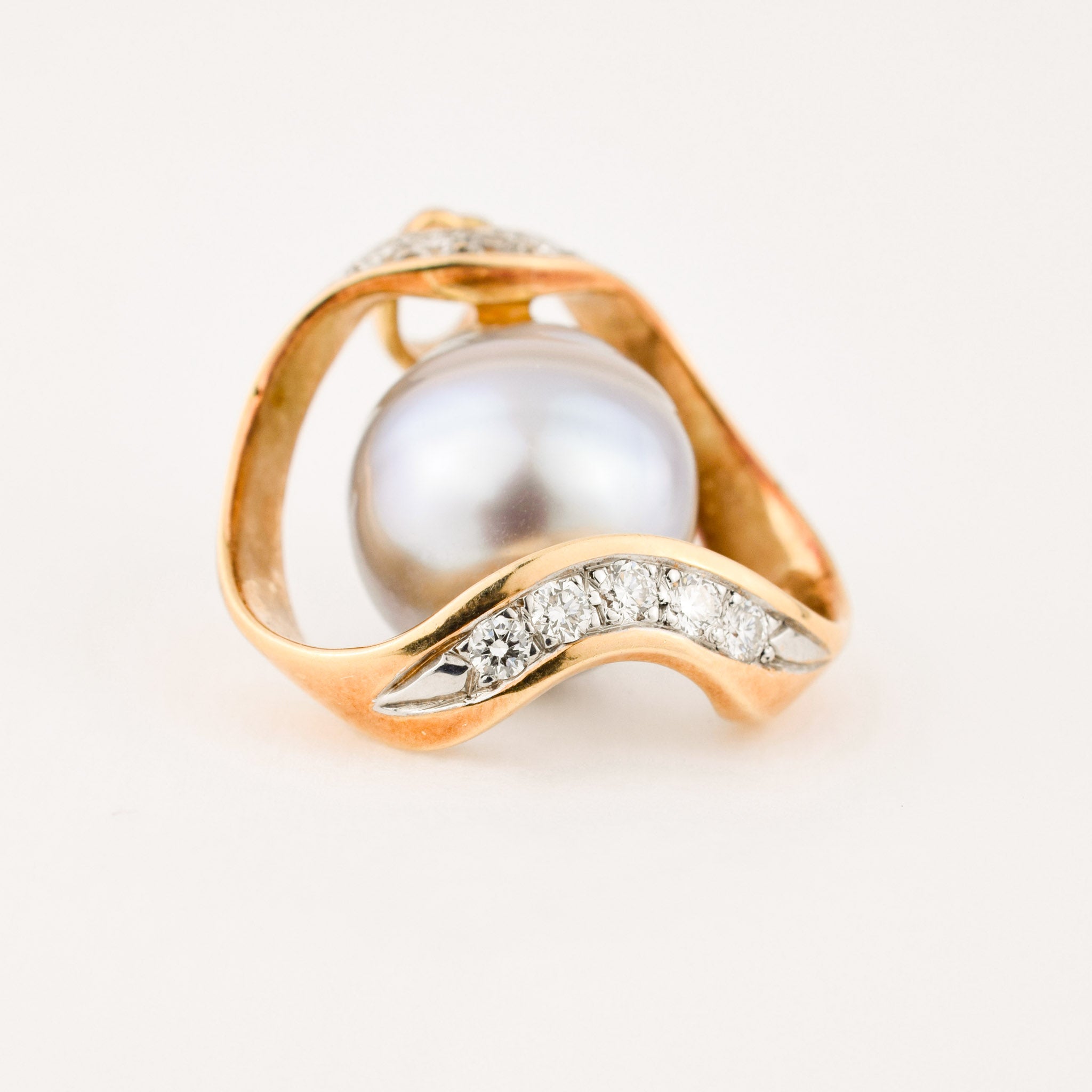 vintage gold baroque pearl pendant with brilliant cut diamonds