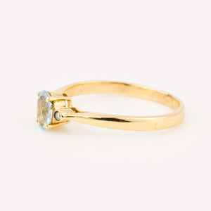 vintage gold dainty blue topaz and diamond ring 