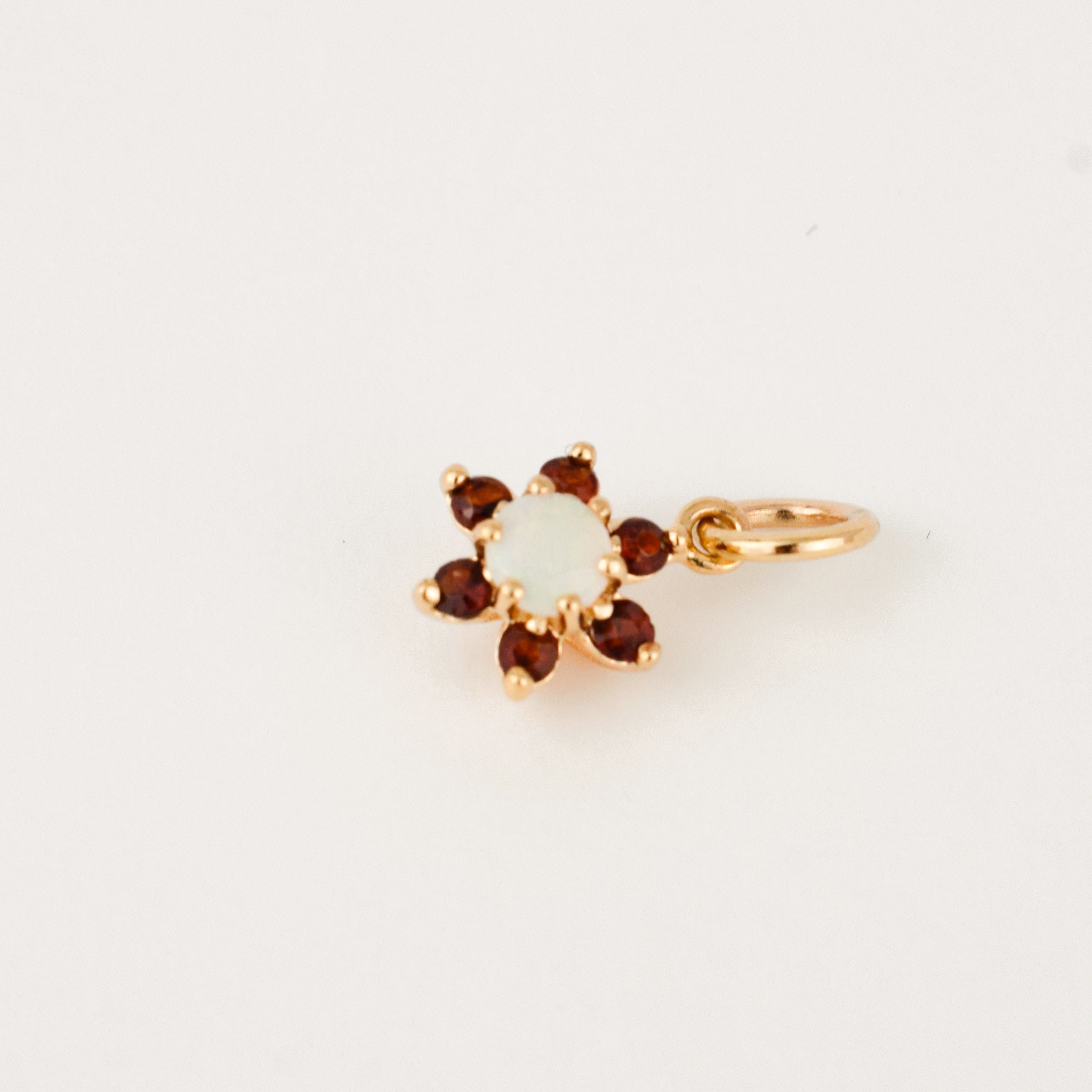 vintage gold garnet and opal flower charm