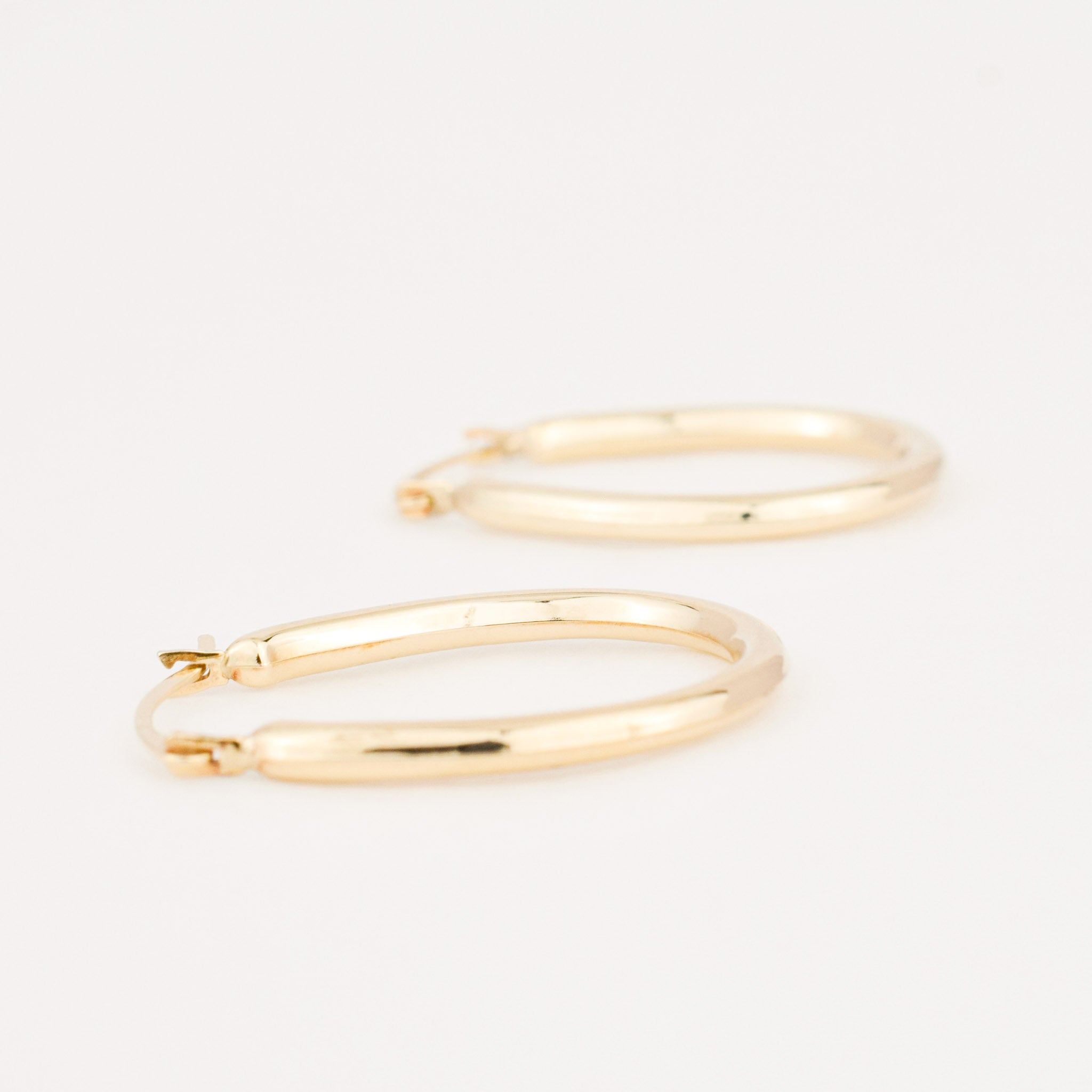 vintage gold oval hoop earrings