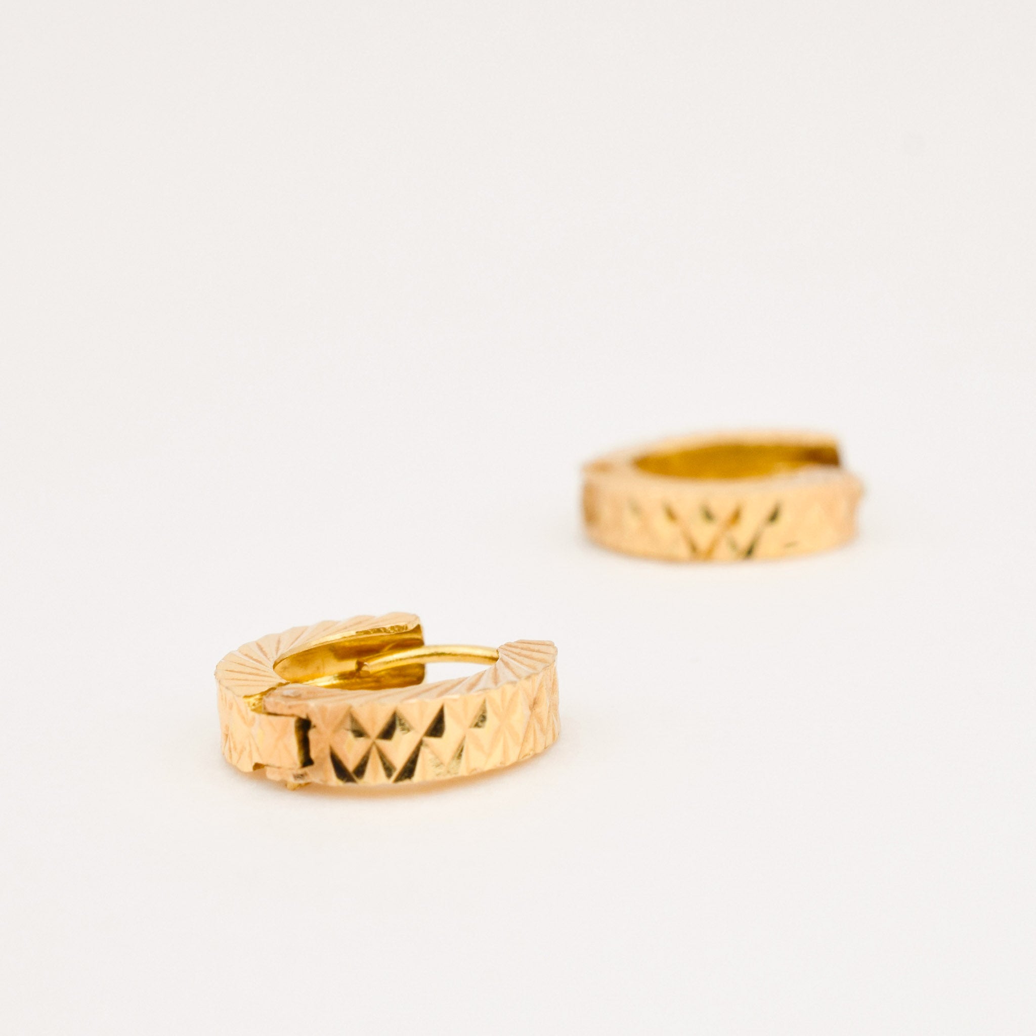 diamond cut gold huggie hoop earrings