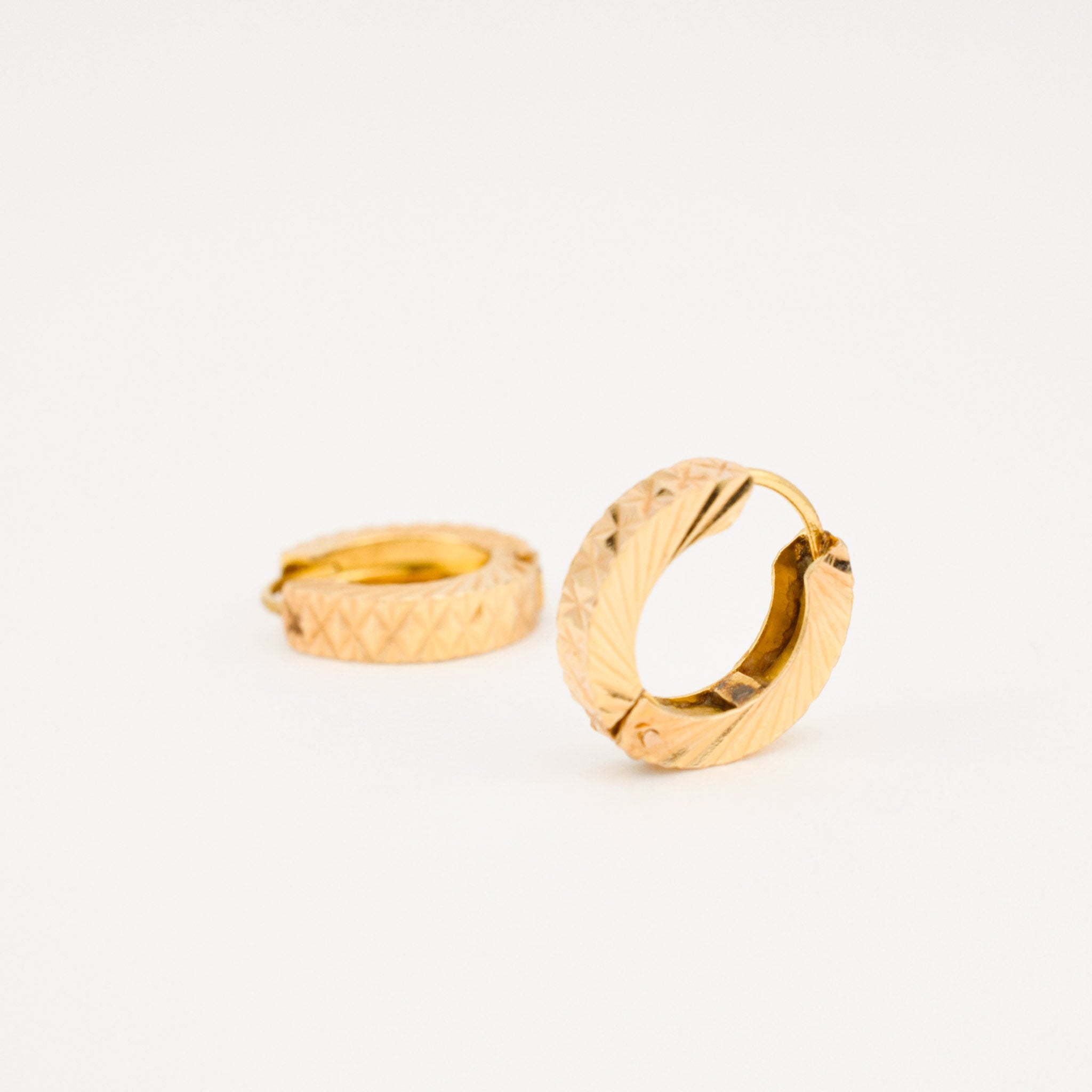diamond cut gold huggie hoop earrings