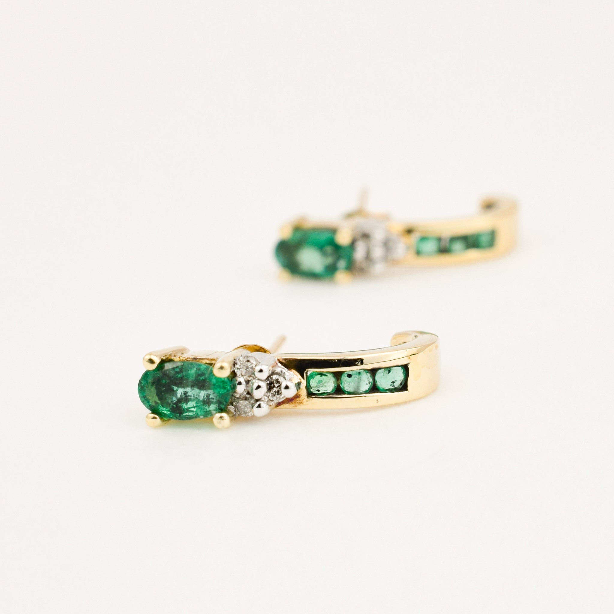 vintage gold emerald and diamond half hoop earrings 