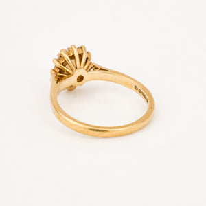 vintage gold opal and diamond halo ring 