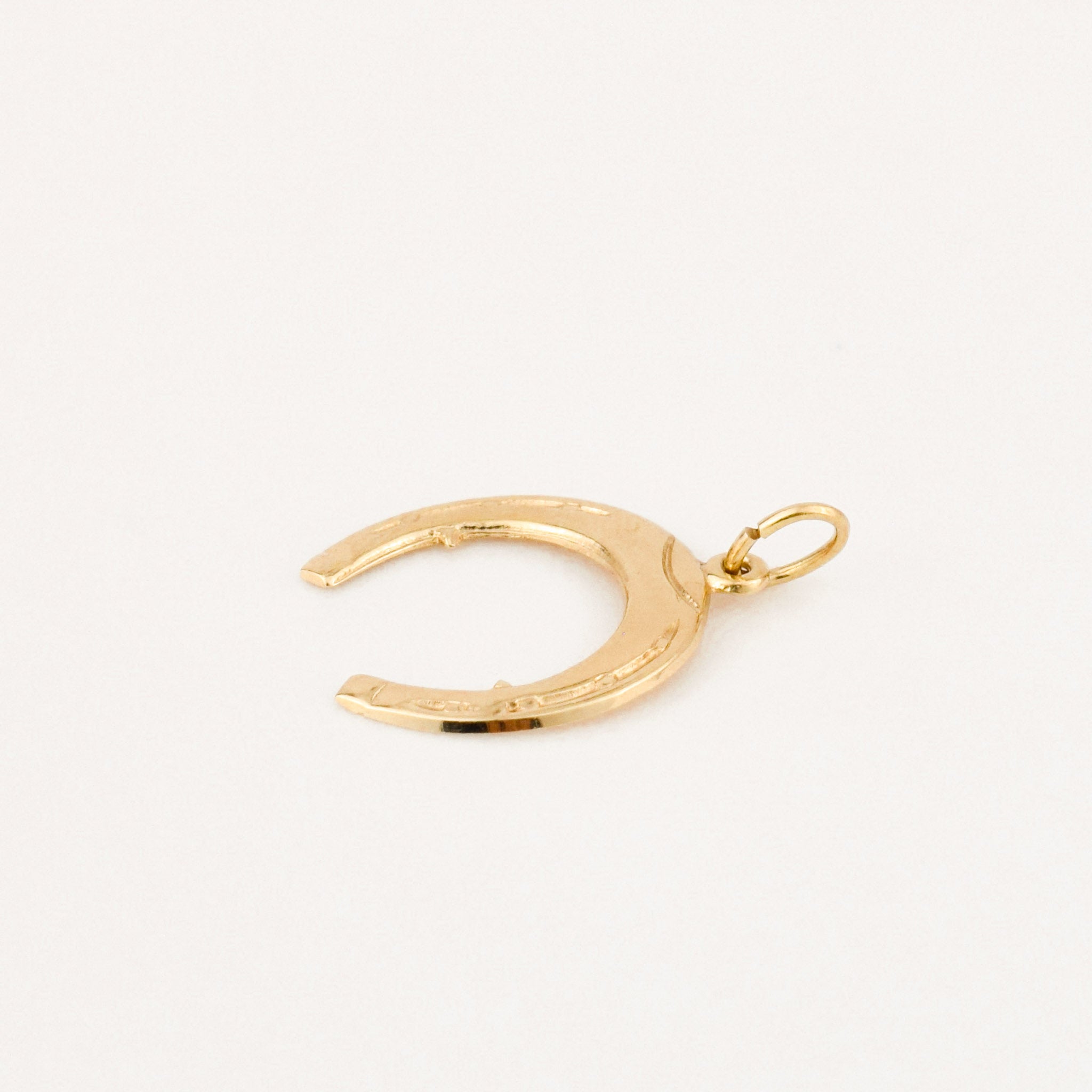 vintage gold horseshoe charm