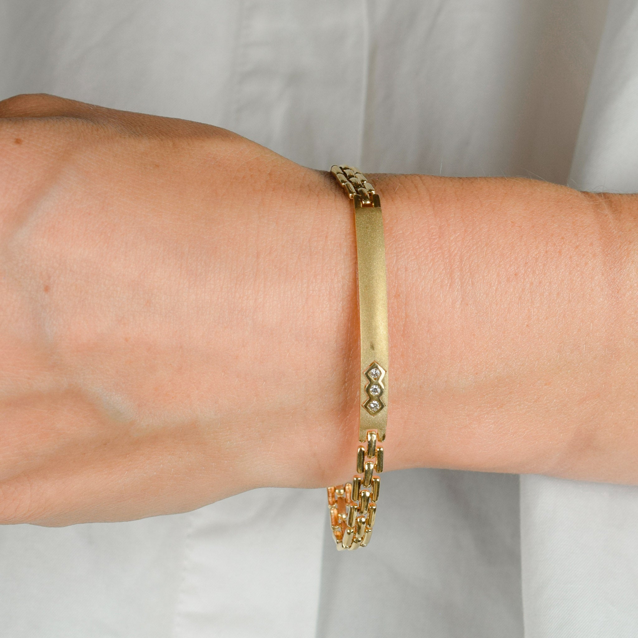 vintage brushed gold ID bracelet with diamonds 
