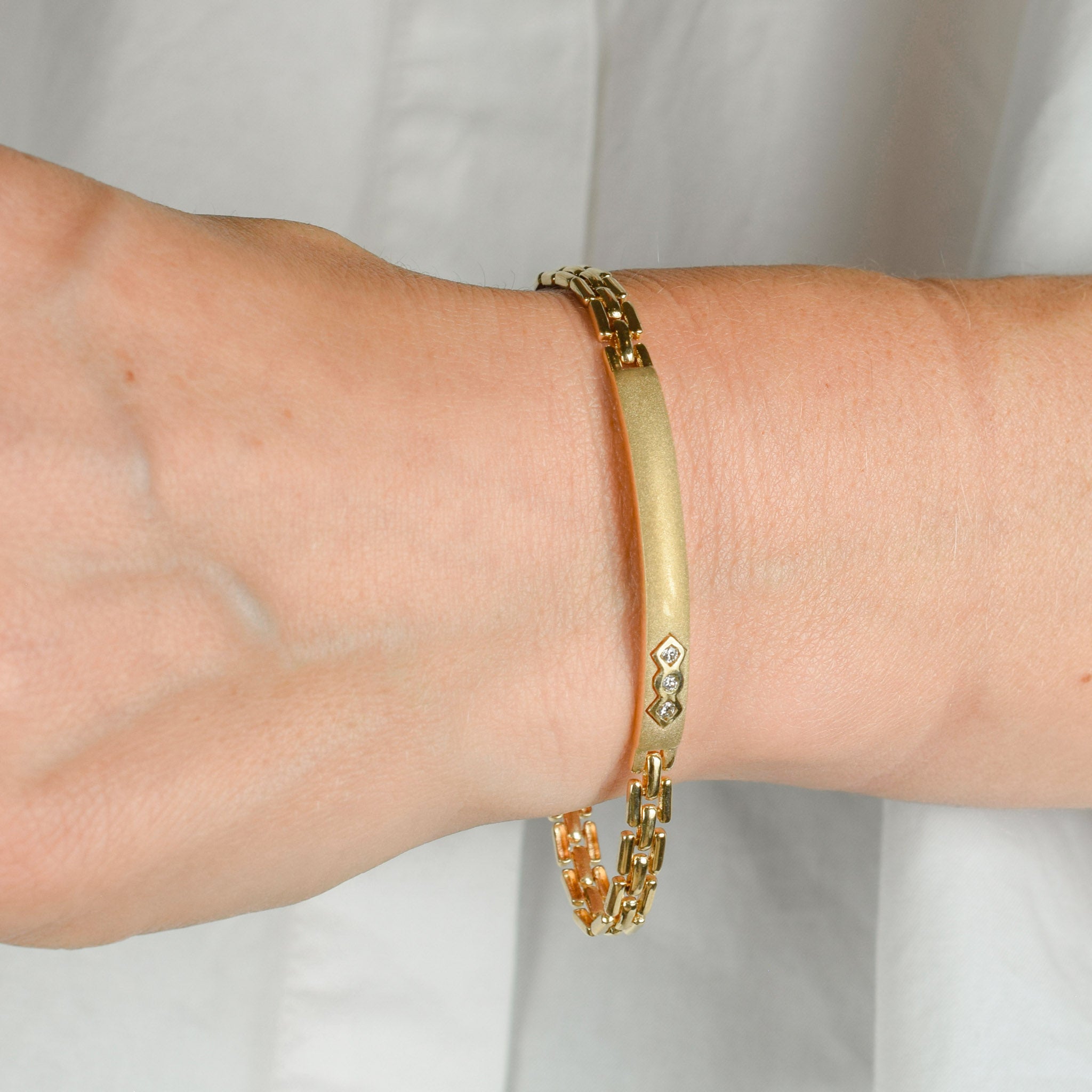 vintage brushed gold ID bracelet with diamonds 