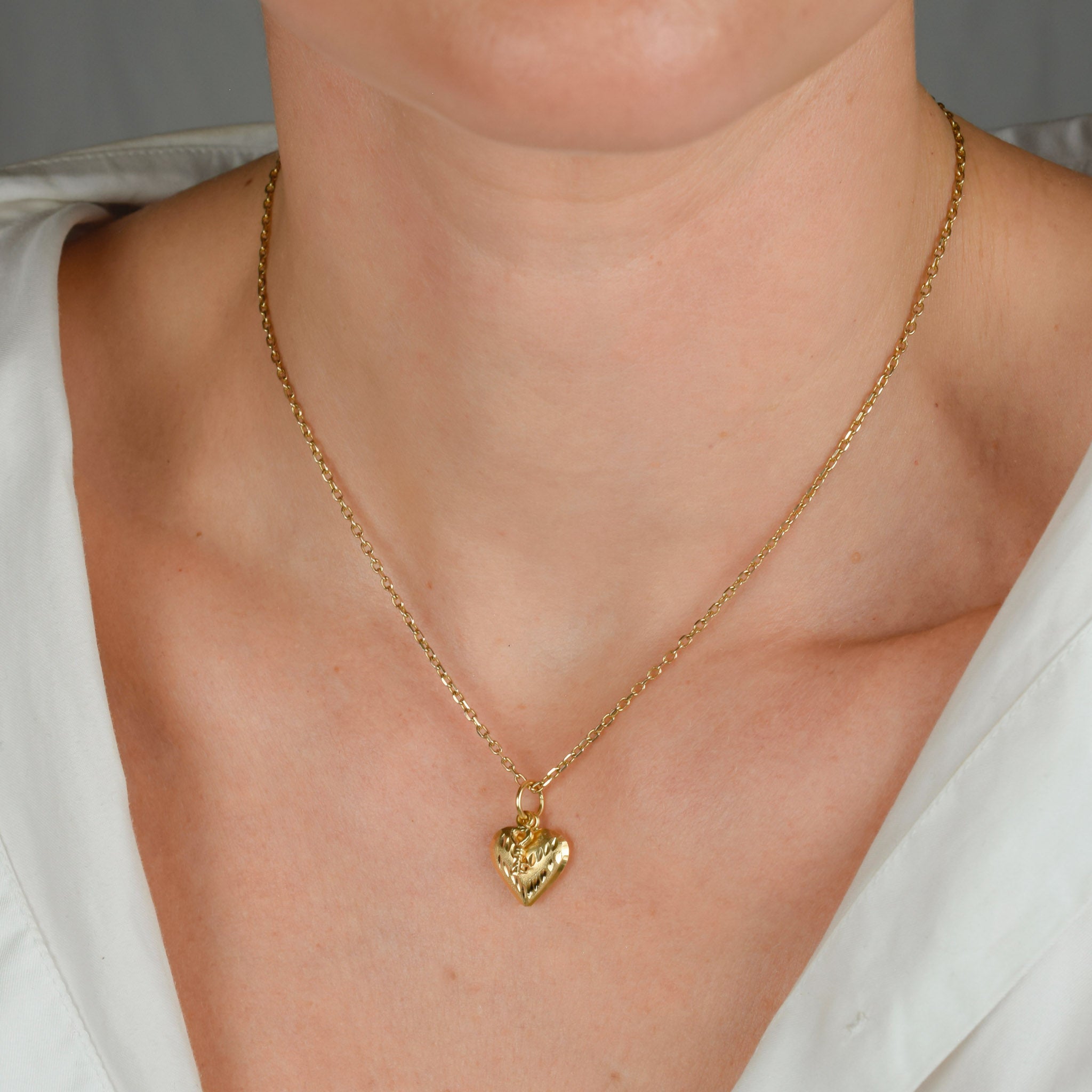 vintage gold heart and key charm pendant 