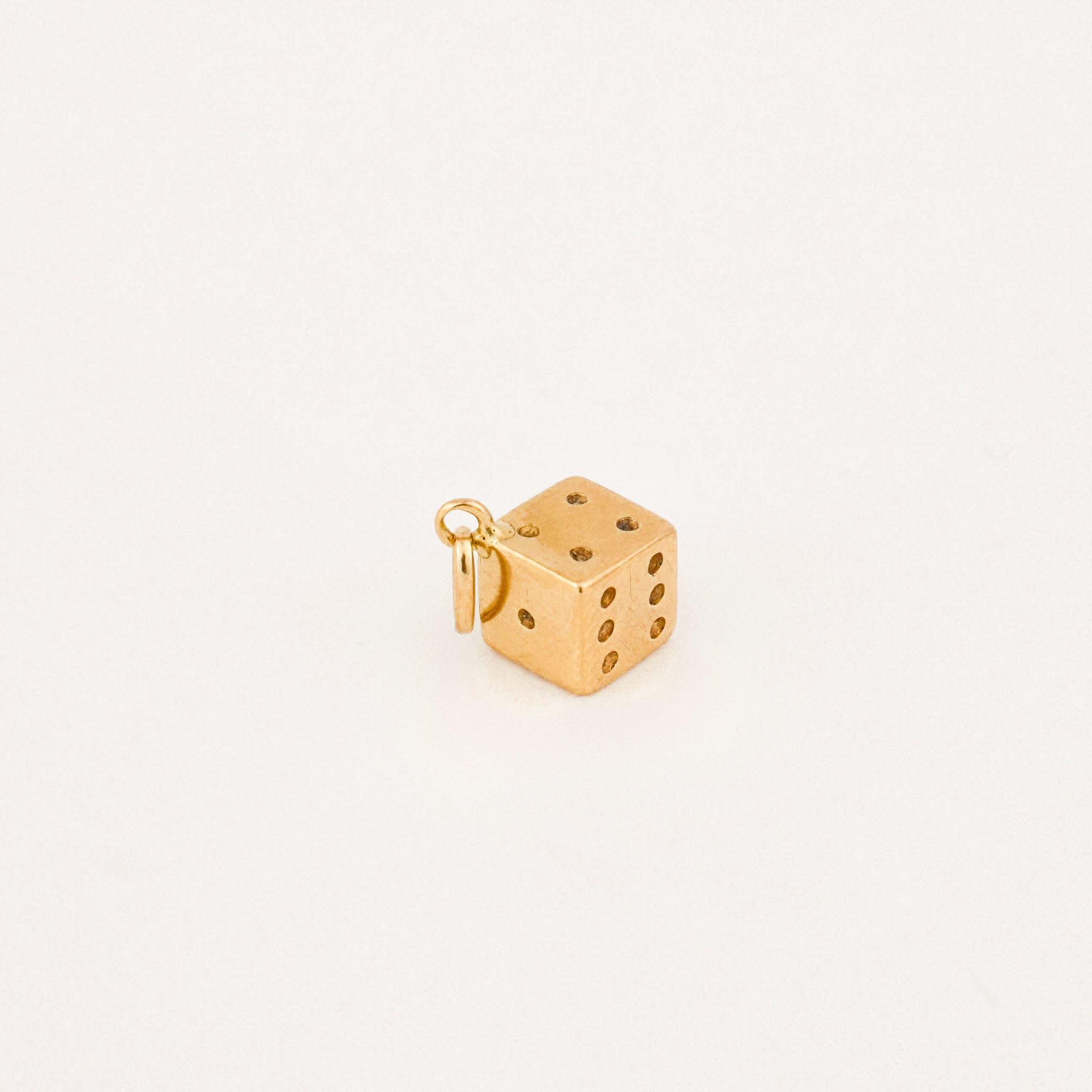 vintage gold die charm pendant 